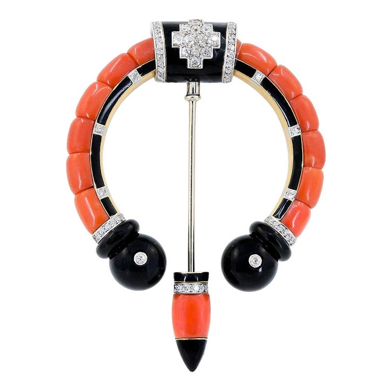 Cartier diamond, coral and onyx brooch, 1920s