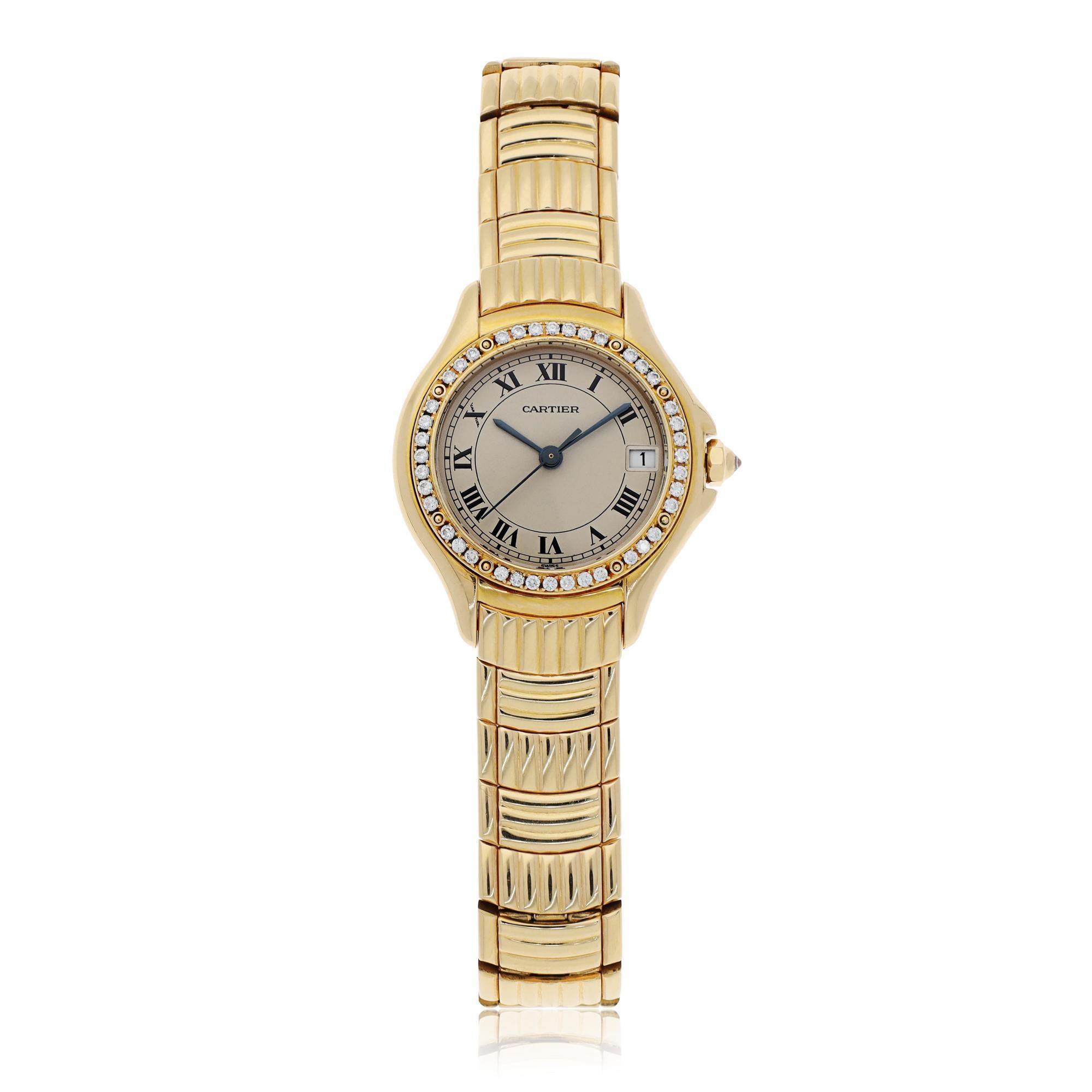 18K Yellow Gold 26mm Case with Integrated Reed Link Bracelet and Quartz Movement.
Factory Brilliant-Cut Diamond Bezel with a Silver Matte Dial with Black Roman Numeral Hour Markers.
Blued Steel Sword-Shapped Hands, Railway Track, and a Date Window