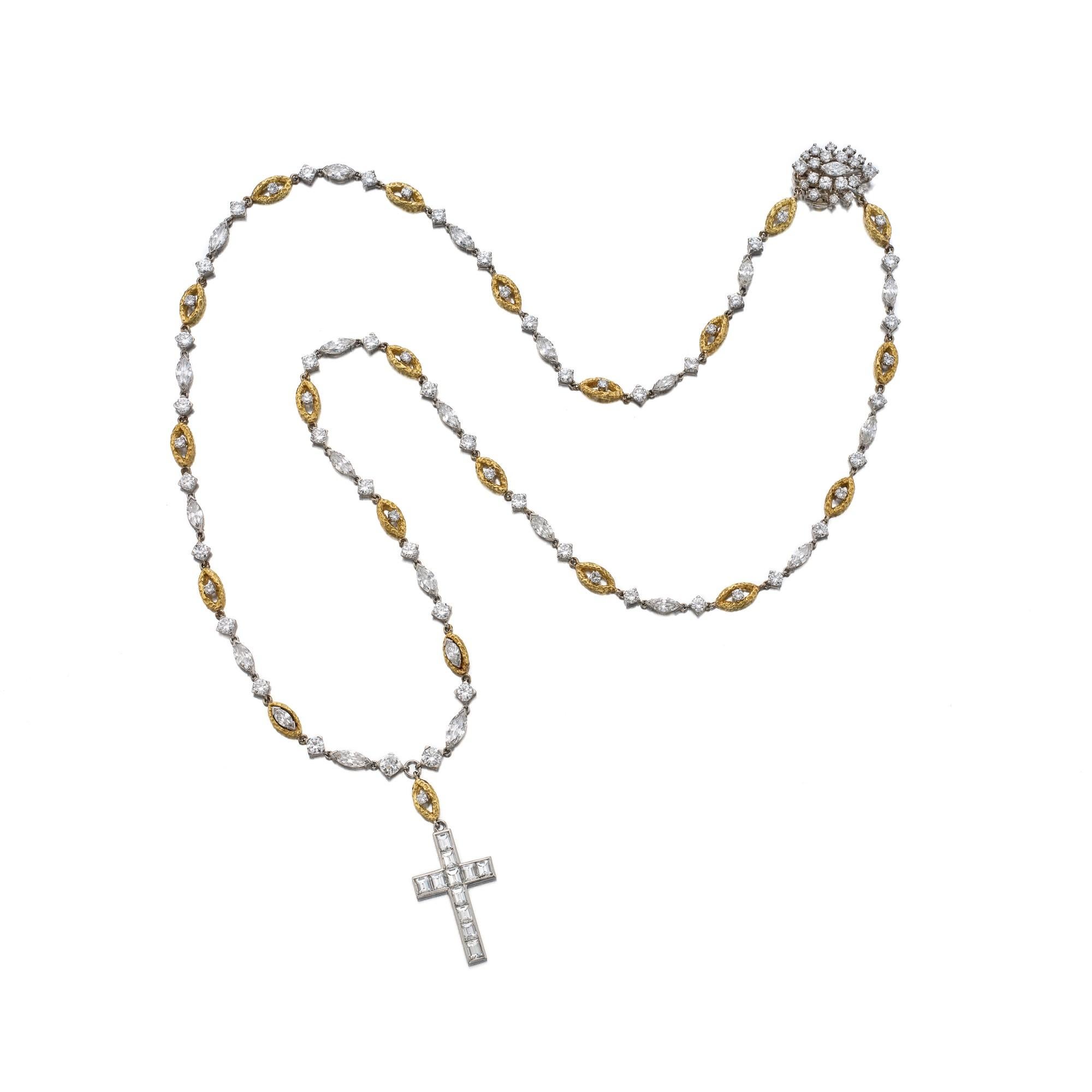 Cartier Diamond Cross Pendant- Necklace In Platinum And 18k Yellow  Gold. The chain ofthis necklace alternates navette and square-shaped links, equipped with box clasp with a security lock. The lock and each of the links are set with old marquise,