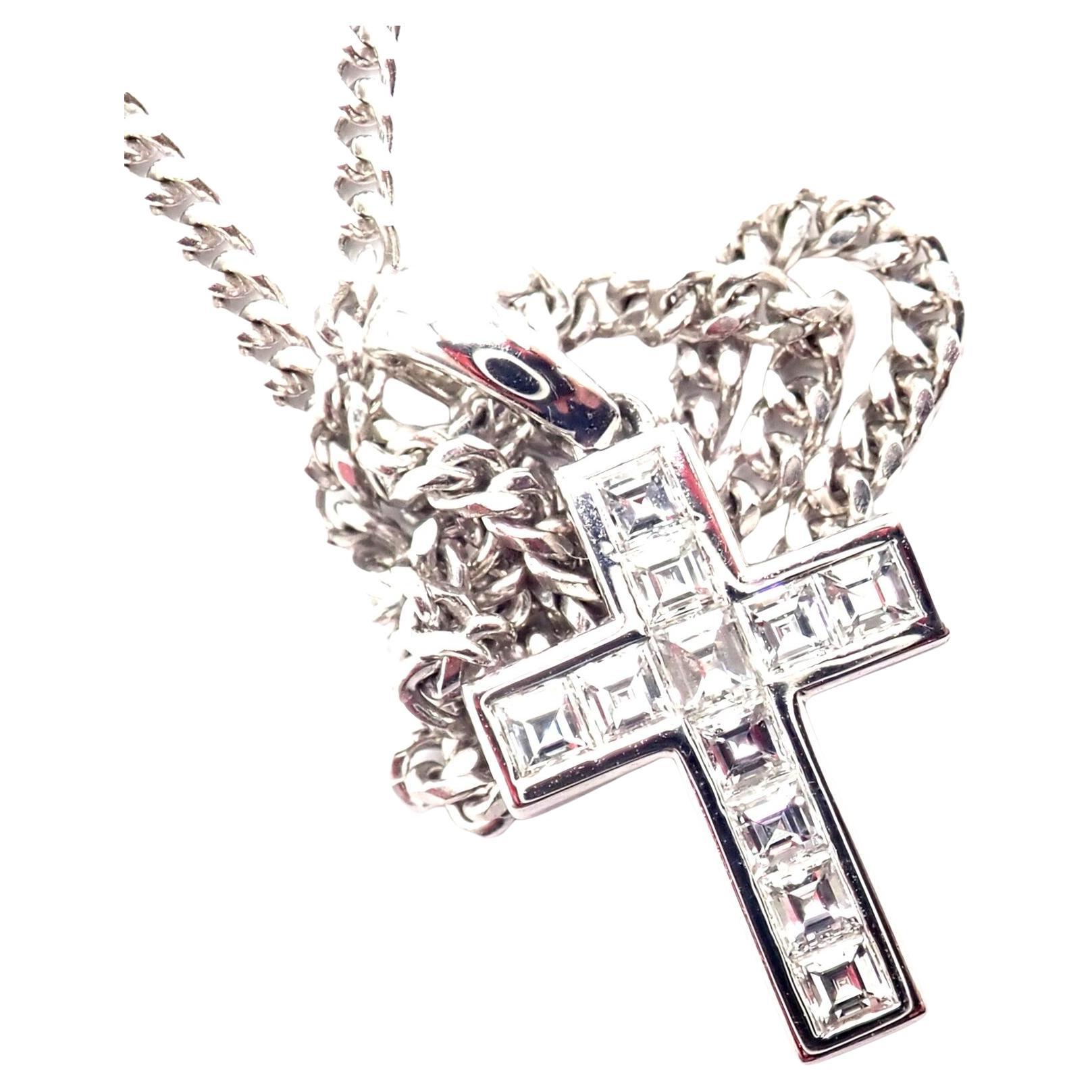 19k White Gold Diamond Cross Pendant Necklace by Cartier. 
The Authentic Cartier Diamond Cross Necklace is crafted in 18k white gold. 
Featuring a delicate cross adorned with sparkling diamonds, this elegant piece exemplifies Cartier's timeless