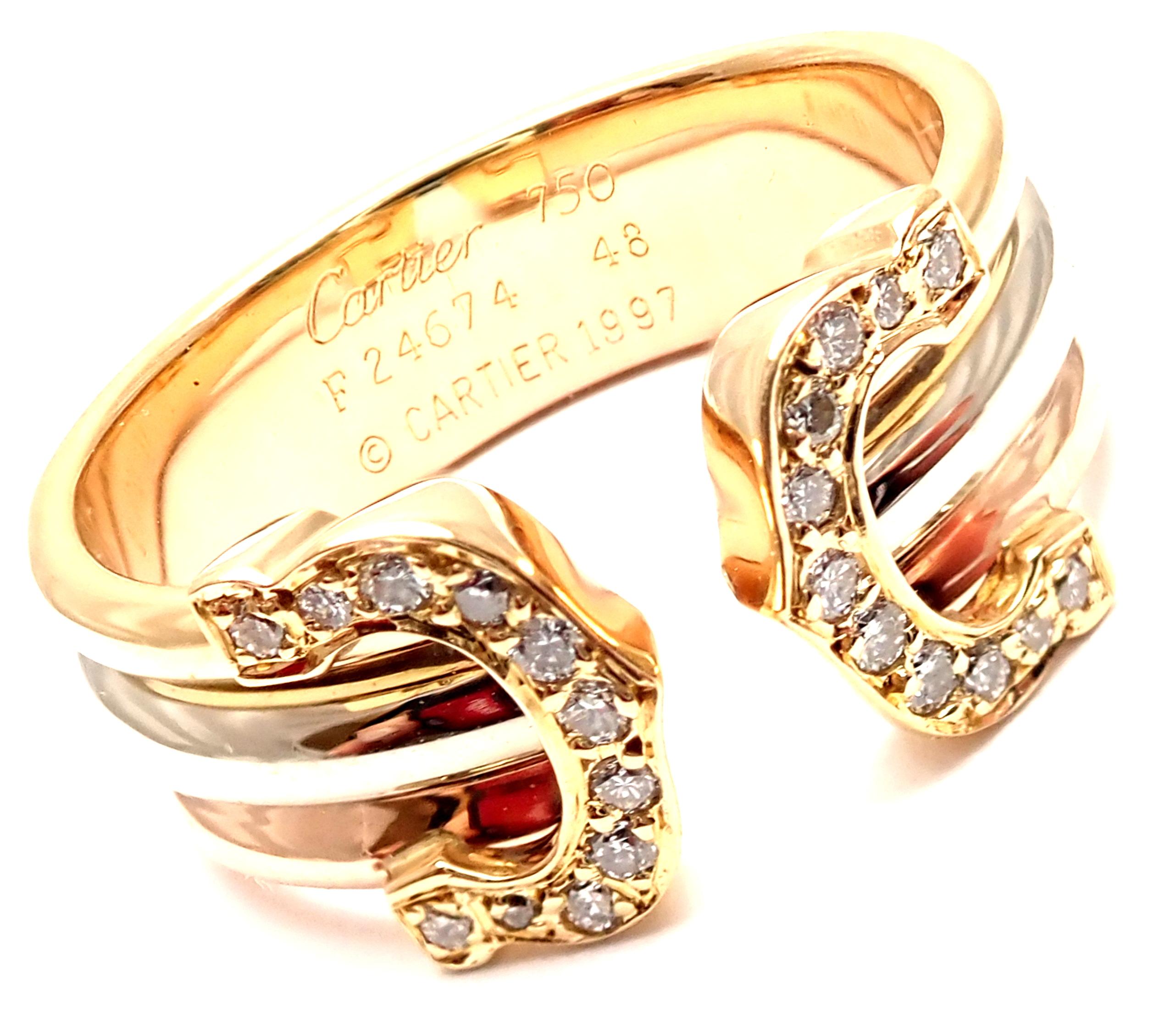 18k Tri-Color Gold (Yellow, White, Rose) Diamond Double-C Band Ring by Cartier. 
With 11 round brilliant cut diamonds VS1 clarity, G color total weight approx. .22ct
Details: 
Weight: 4.5 grams
Size: European 48, US 4.5
Width: 8mm
Stamped Hallmarks:
