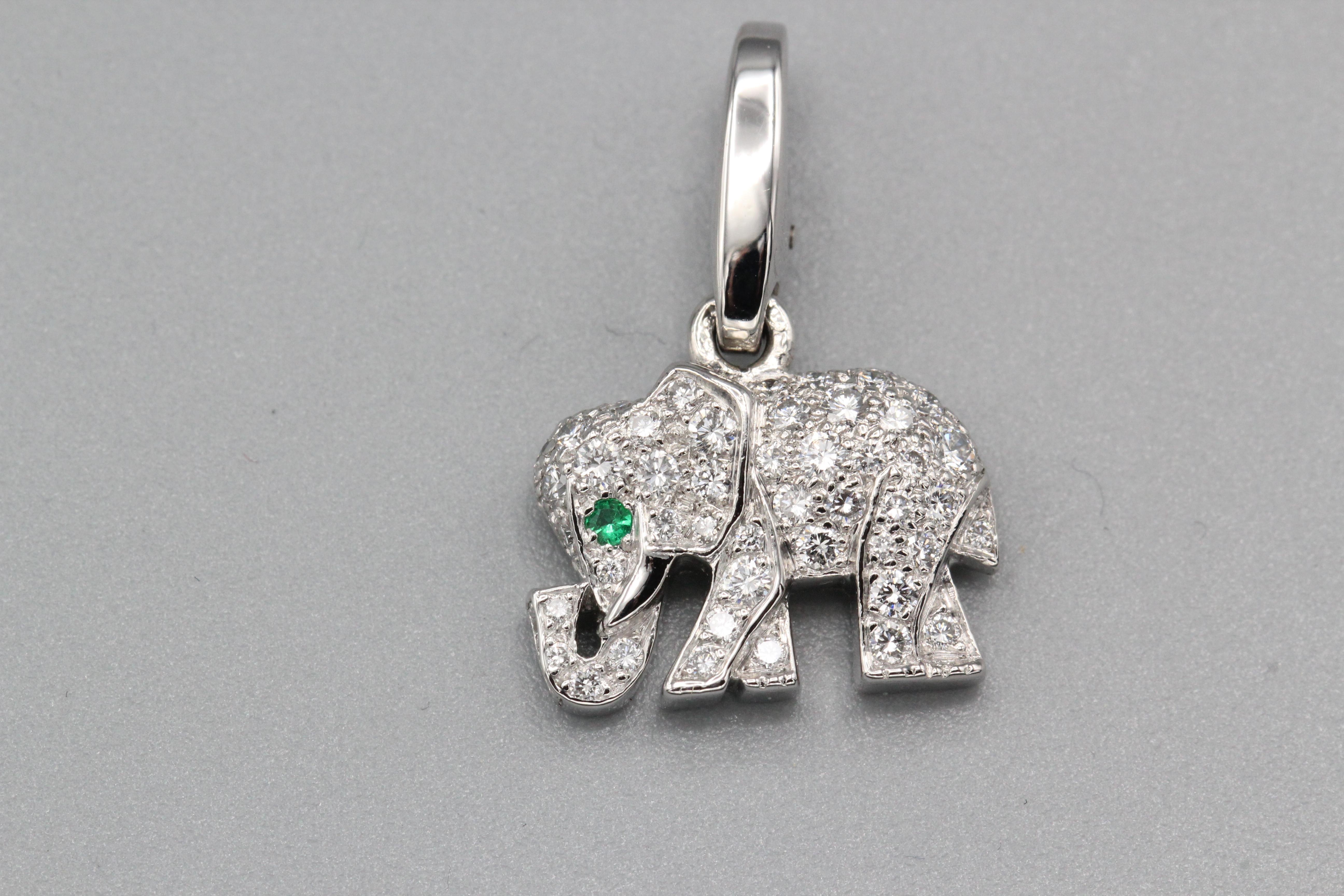 Evoke the majesty of the animal kingdom and the allure of fine jewelry with the Cartier Diamond Emerald 18 Karat White Gold Elephant Charm. This enchanting charm showcases the legendary craftsmanship of Cartier, marrying precious materials,