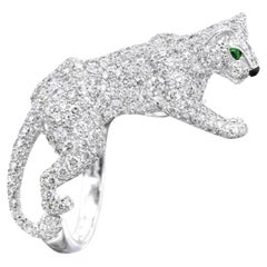 Anillo Panthère Cartier de diamantes, esmeraldas y ónice