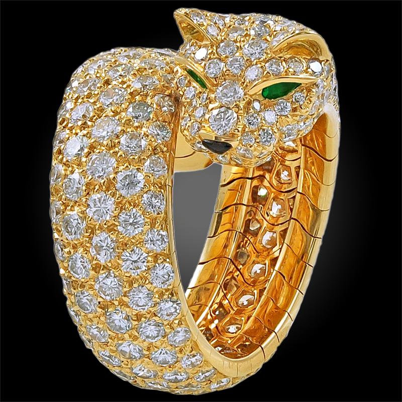 Panthère de Cartier ring, 18K gold, set with 308 brilliant-cut diamonds totaling 6.52 carats. Emeralds, onyx. Ring size 55