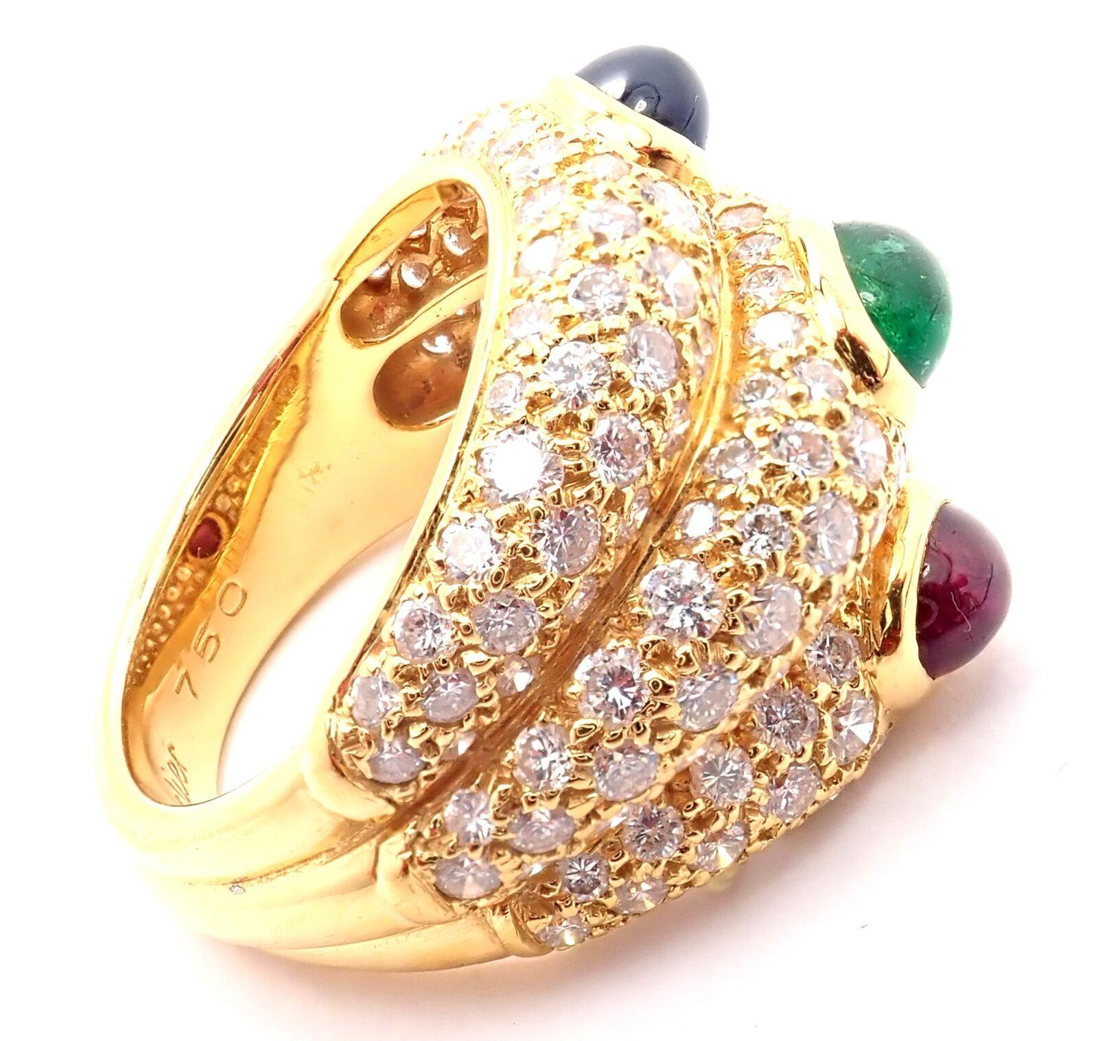 18k Yellow Gold Diamond Sapphire Emerald Ruby Wide Band Ring by Cartier.
With Round brilliant cut diamonds VVS1 clarity, F-H color total weight approximately 4ct
1 oval ruby, 1 oval emerald, 1 oval sapphire
Measurements:
Ring Size: European 54, US 6