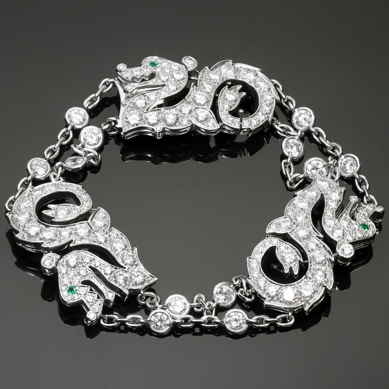 This iconic Cartier bracelet features three dragons crafted in 18k white gold, set with brilliant-cut round diamonds, accented with circular-cut emerald eyes and completed with a double cable-link chain, spectacle-set with brilliant-cut diamonds.
