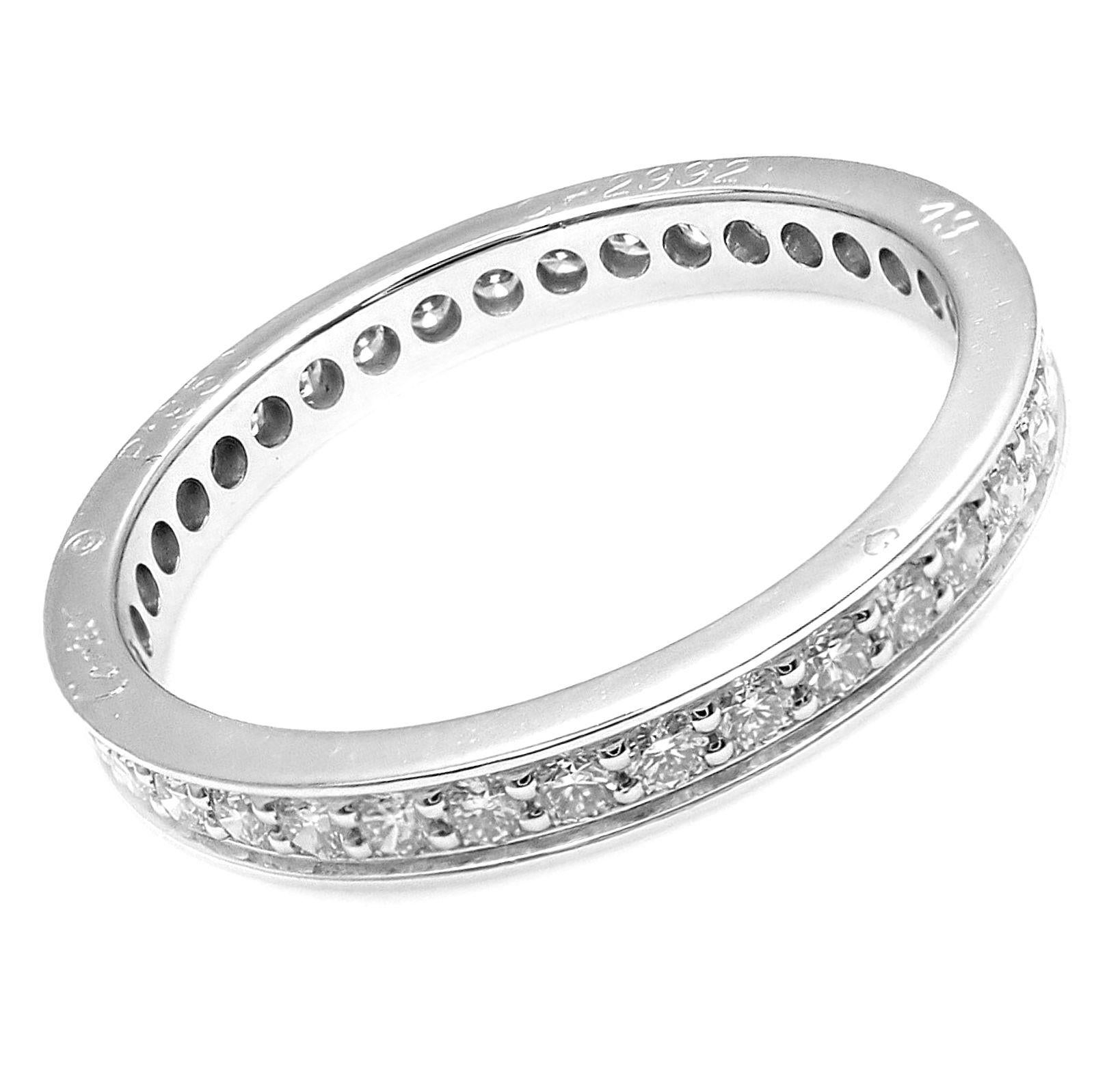 Platinum Diamond Eternity Band Ring by Cartier.
With 45 round brilliant cut diamonds VVS1 clarity, E color total weight approximately 0.70ct 
Details:
Ring Size: European 49, US 5
Weight: 2.4 grams
Width:  2mm
Stamped Hallmarks:  PT950 Cartier 49