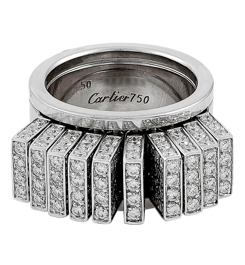 A remarkably crafted 18k white gold movable fan like ring by Cartier, elegantly set with a pave of stunning diamonds surrounding each moveable piece. 
Signed Cartier.
ring size 50