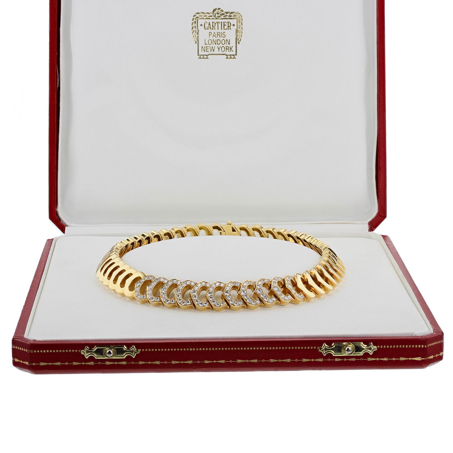 From the C de Cartier collection, this choker necklace features links in the style of the famous Cartier 'C' motif. The front 11 links are set with brilliant-cut diamonds of VVS1 clarity, F colour, and approximately seven carats. Signed Cartier and