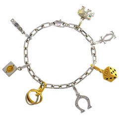 Cartier Diamond Gold Charm Bracelet with Signature Cartier Charms