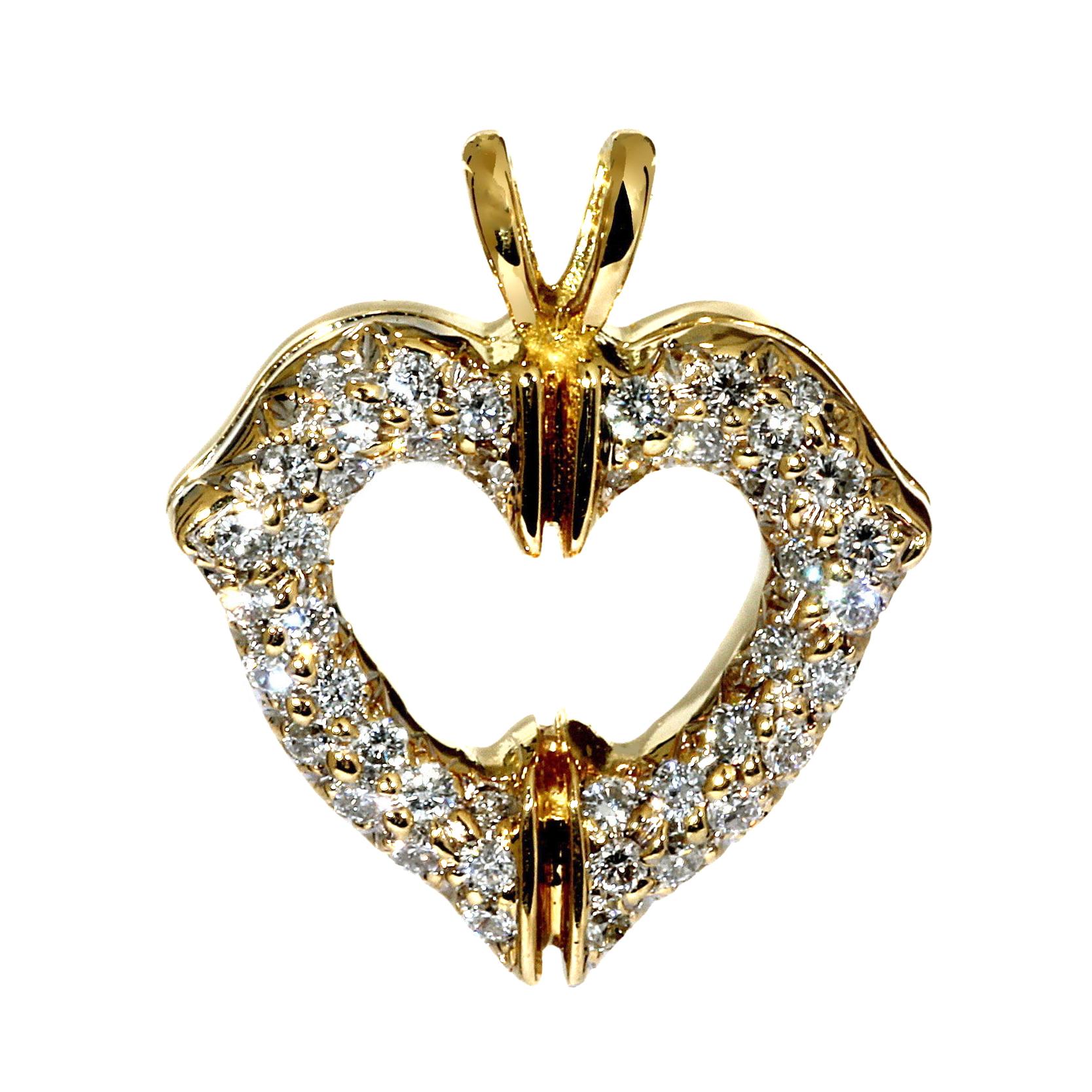 A lovely authentic Cartier heart diamond pendant set with the finest Cartier round brilliant cut diamonds in 18k yellow gold.

Dimensions: 17mm wide (.67″ Inches) by 19mm (.75″ Inches) in length

Inventory ID: 0000117