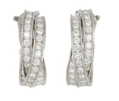 Cartier diamond hoop earrings, French, circa 1970.