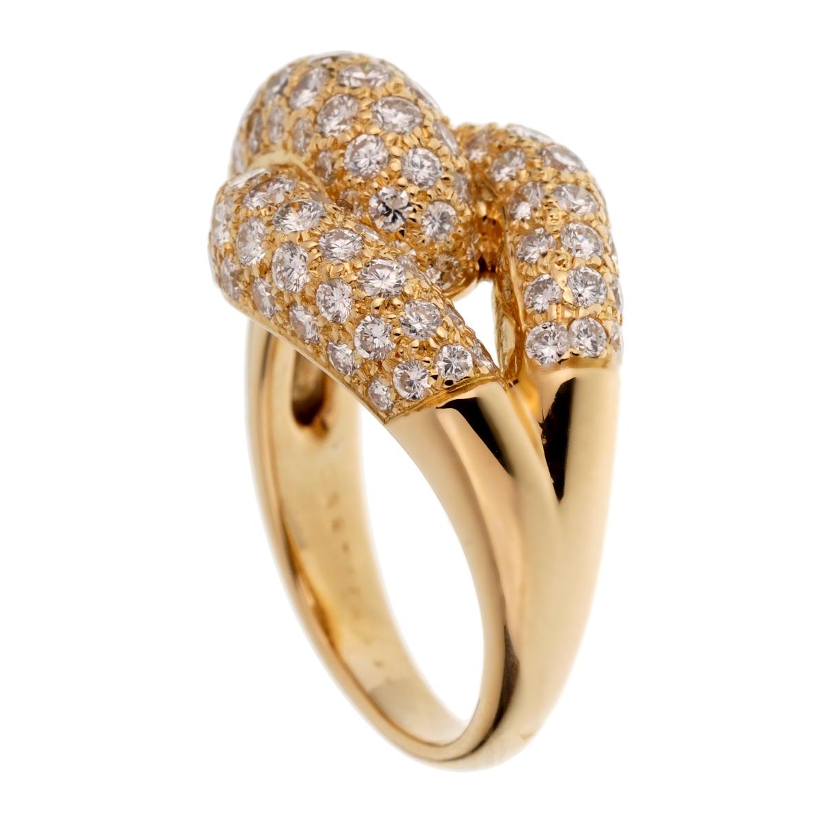 A magnificent cartier diamond cocktail ring boasting 2.25ct of the finest round brilliant cut diamonds in shimmering 18k yellow gold. The ring measures a size 6 and can be resized.

Sku: 2529