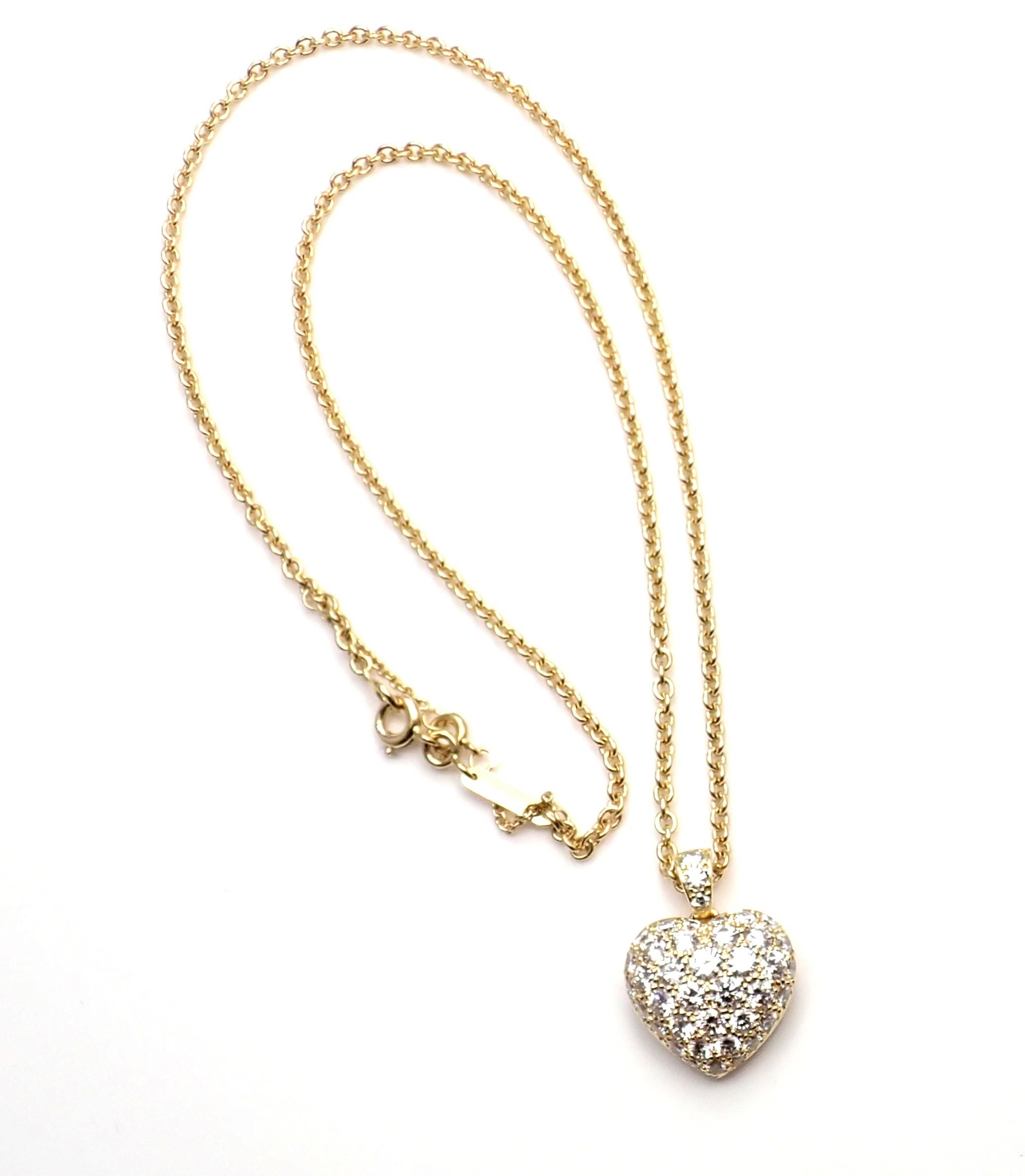 18k Yellow Gold Diamond Heart Pendant Necklace by Cartier. 
With Round brilliant cut diamonds VS1 clarity E color total weight approx. 1.40ct
Details: 
Chain: Width: 2mm
Length: 16.5