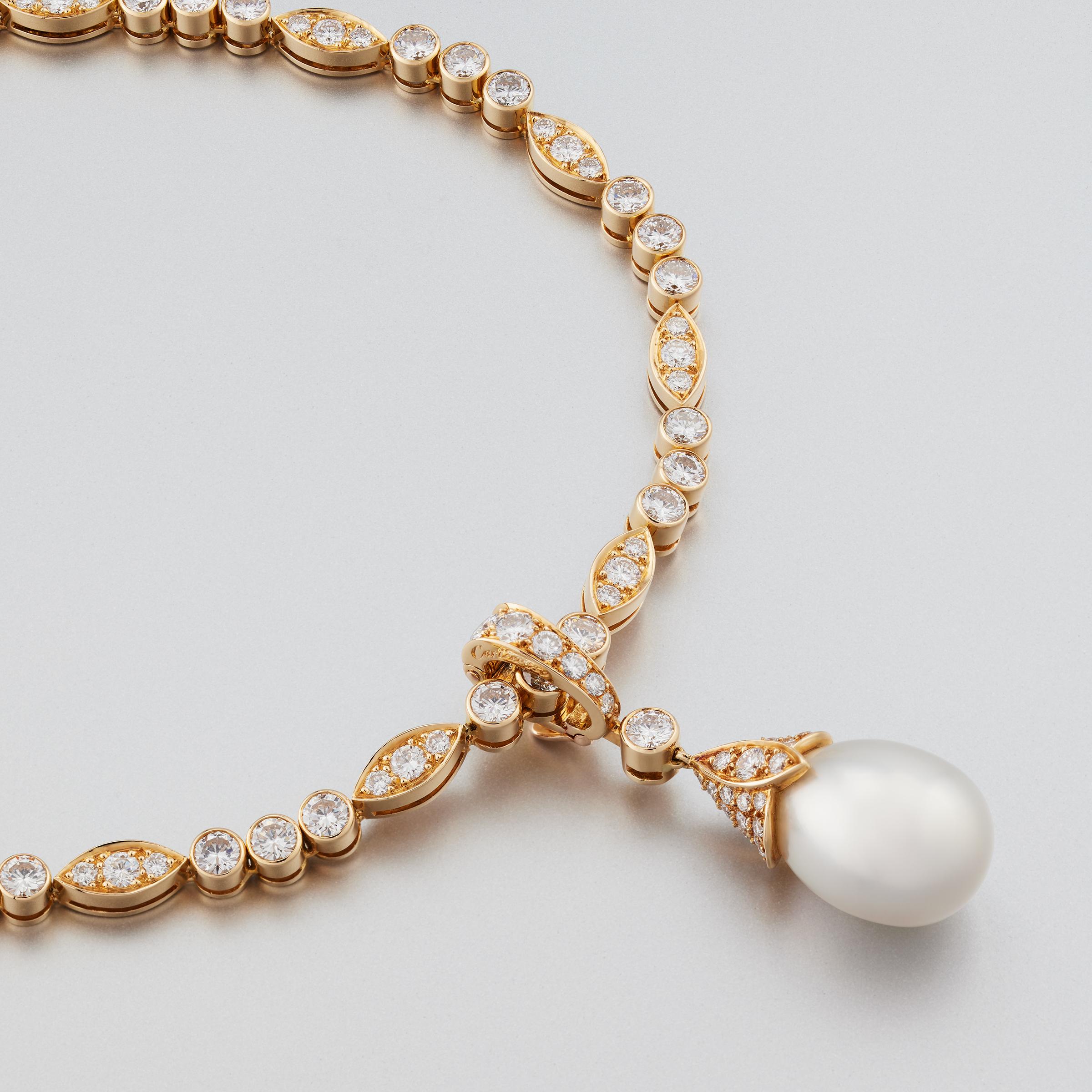 Exceptional Cartier Paris diamond line necklace featuring a detachable large pearl drop and diamond pendant. The necklace and pendant boast approximately 12 carats of finest quality diamonds (E-F color and VVS clarity) set in lavish 18 karat yellow