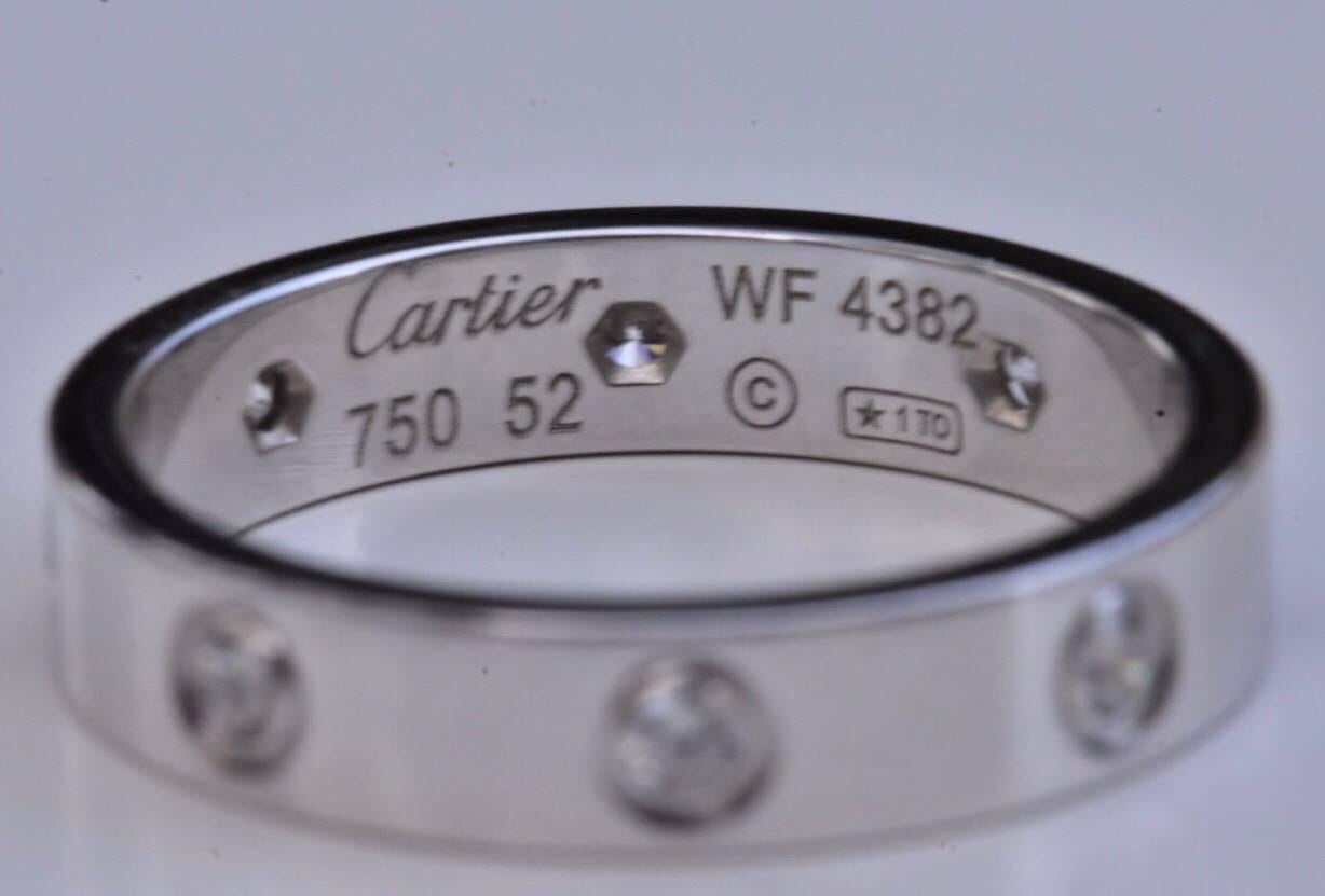 A Cartier Love full diamond ring set in 18k white gold. The ring features 8 brilliant-cut diamonds of approx each set to a plain 18k white gold band. The ring is sold with the certificate, invoice and box.

Retail price $3850

Measurements: Band is
