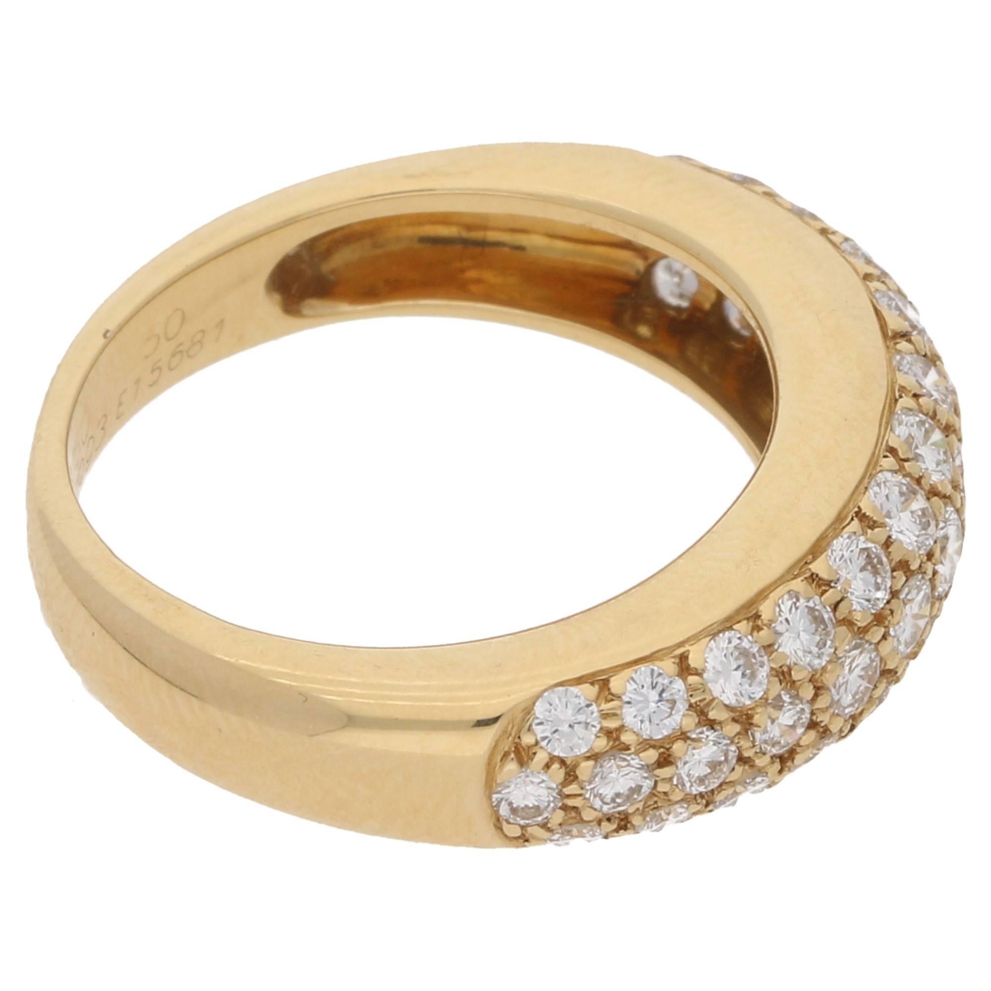 A classic Cartier Mimi Star ring set in 18k yellow gold. This piece is from the iconic Cartier Mimi collection - a successful collection that began in the 1990's and is still popular to this day! 

The is is half pavé set with approximately 1.30