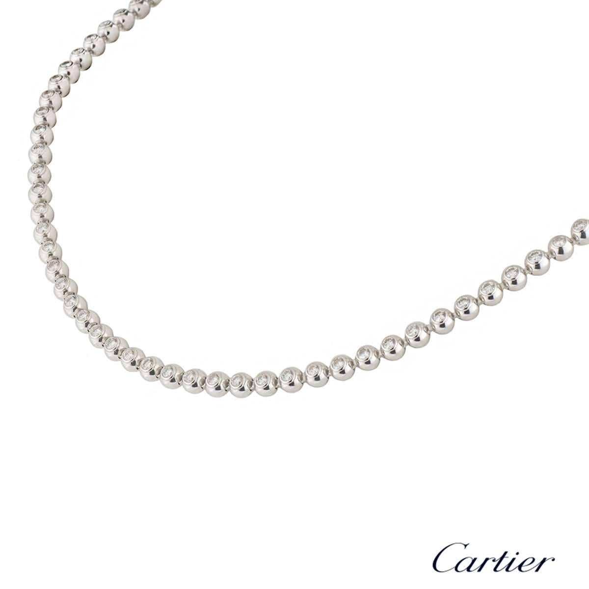 A beautiful 18k white gold Cartier diamond necklace from the Moonlight collection. The necklace comprises of 84 ball motifs with a round brilliant cut diamond in each ball in a rubover setting. The diamonds have a total weight of approximately