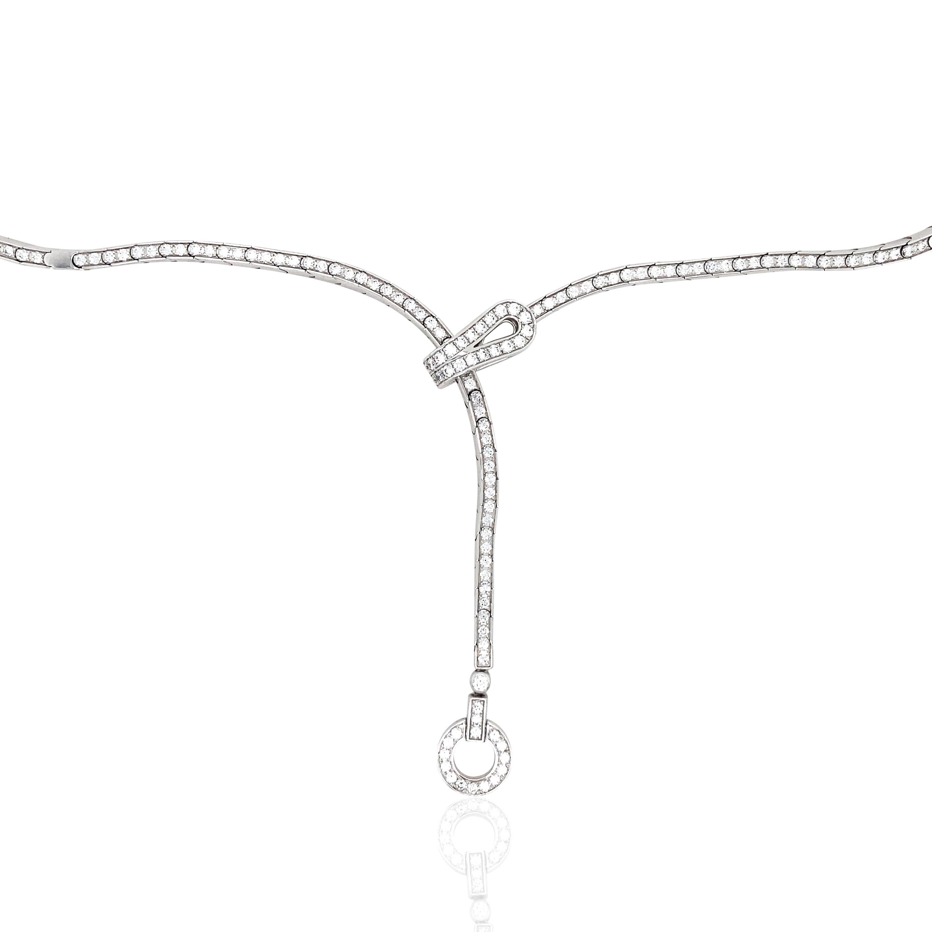 This Cartier diamond necklace features a sleek and minimalist design, combining elegance and fashion. Set with approximately 3.38ct of diamonds, it radiates brilliance, while the 18K gold material enhances its luxurious appeal. The necklace is 53cm