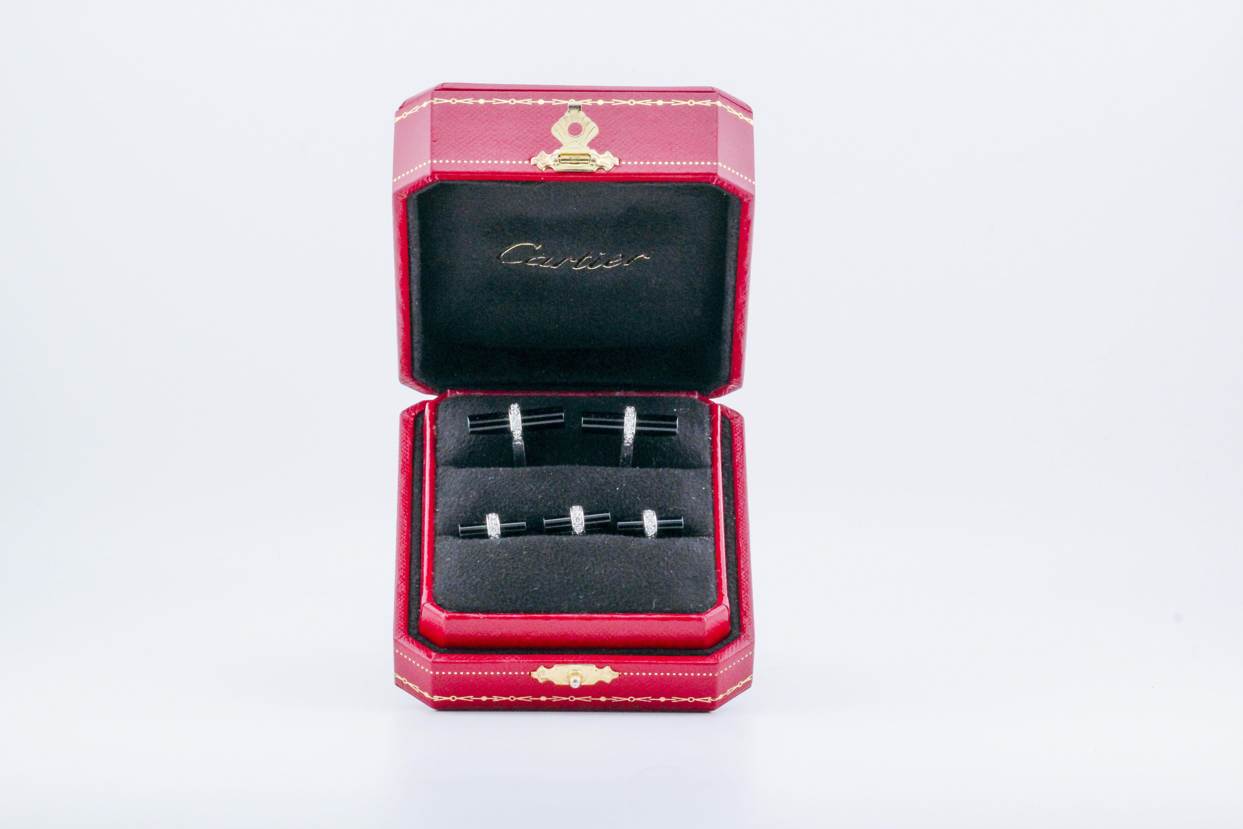 The Cartier Diamond and Onyx Cufflinks are a testament to refined luxury and exquisite craftsmanship. These cufflinks feature a striking combination of white diamonds and black onyx, creating a bold contrast that captures attention. The diamonds,