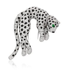 Cartier Spilla a clip con diamante, onice e smeraldo Panthere