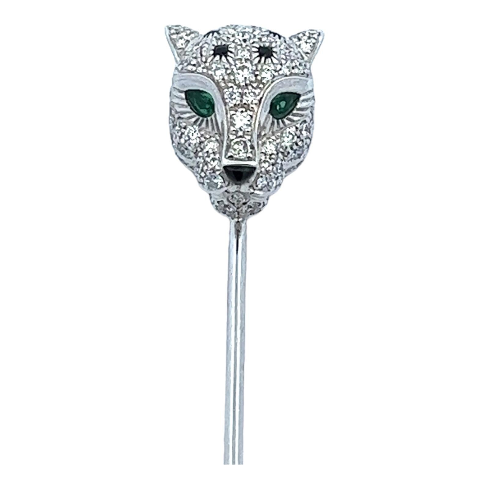 Panthère de Cartier diamond jabot pin, circa 2019, crafted in 18 karat white gold. The pin features 159 round brilliant cut diamonds weighing 1.04 CTW, emerald and onyx accents. The diamonds are graded D-E color VVS clarity. The modern brooch