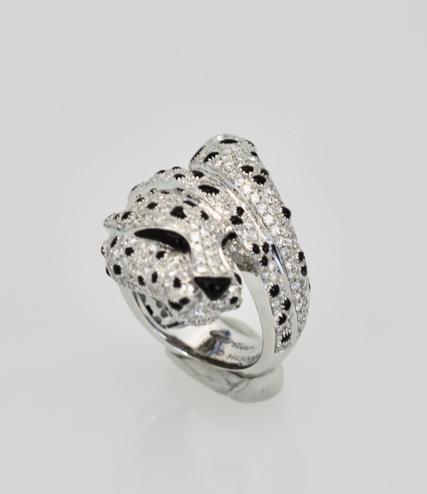 This gorgeous Panthere ring is spectacular and it is retired from the collection.
I call this the bashful Panthere as it looks like it is hiding.  This ring is truly outstanding and unlike all the other Panthere's this one is unique. All the