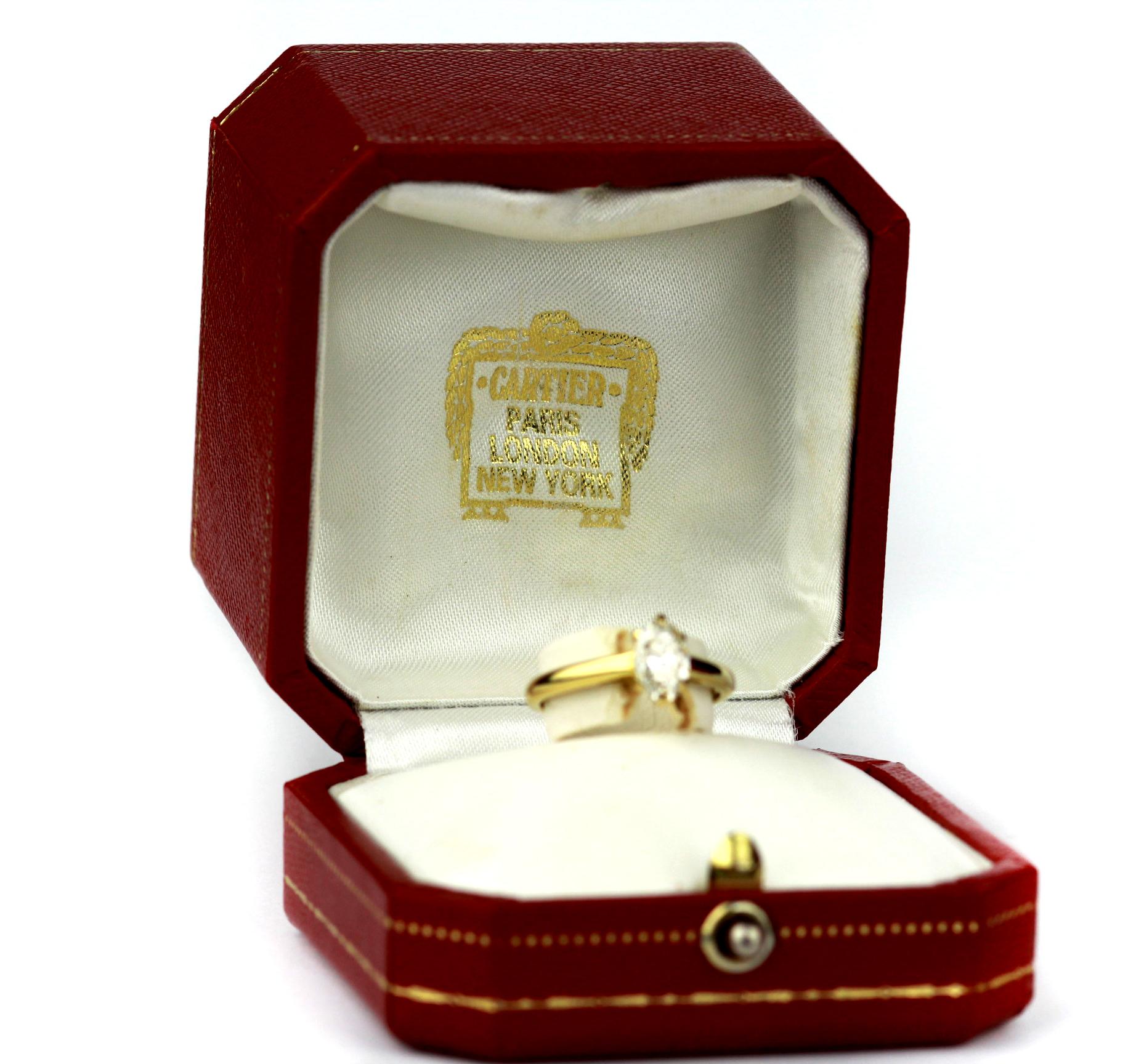 Modern Cartier Diamond, Oval Shape Engagement Ring set in British Hallmarked 18K Gold