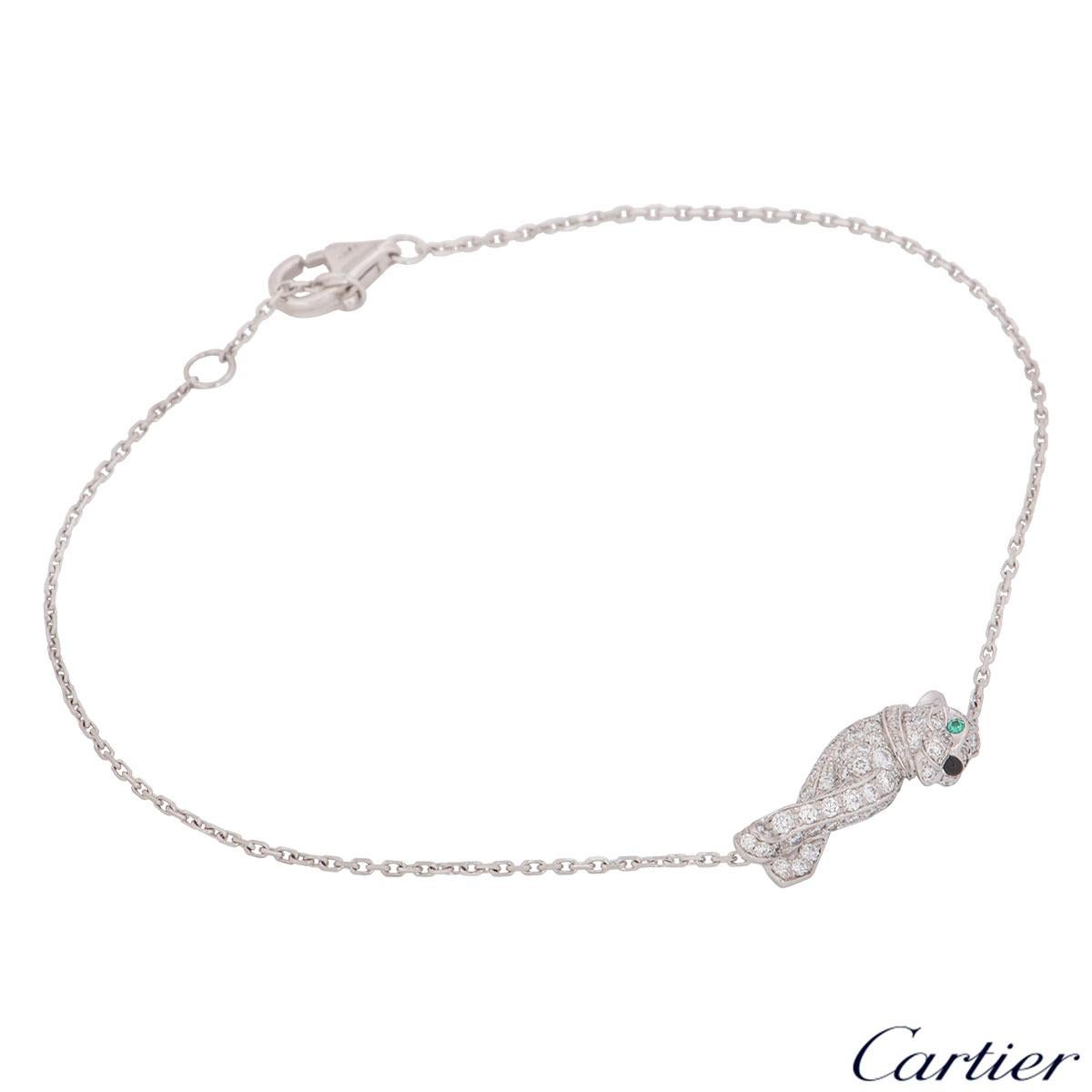 A stylish 18k white gold bracelet by Cartier from the Panthere De Cartier collection. The bracelet comprises of a panthere motif is set with 78 diamonds with a weight of 0.38ct, tsavorite eyes and a black lacquer nose. The panthere measures 0.80cm