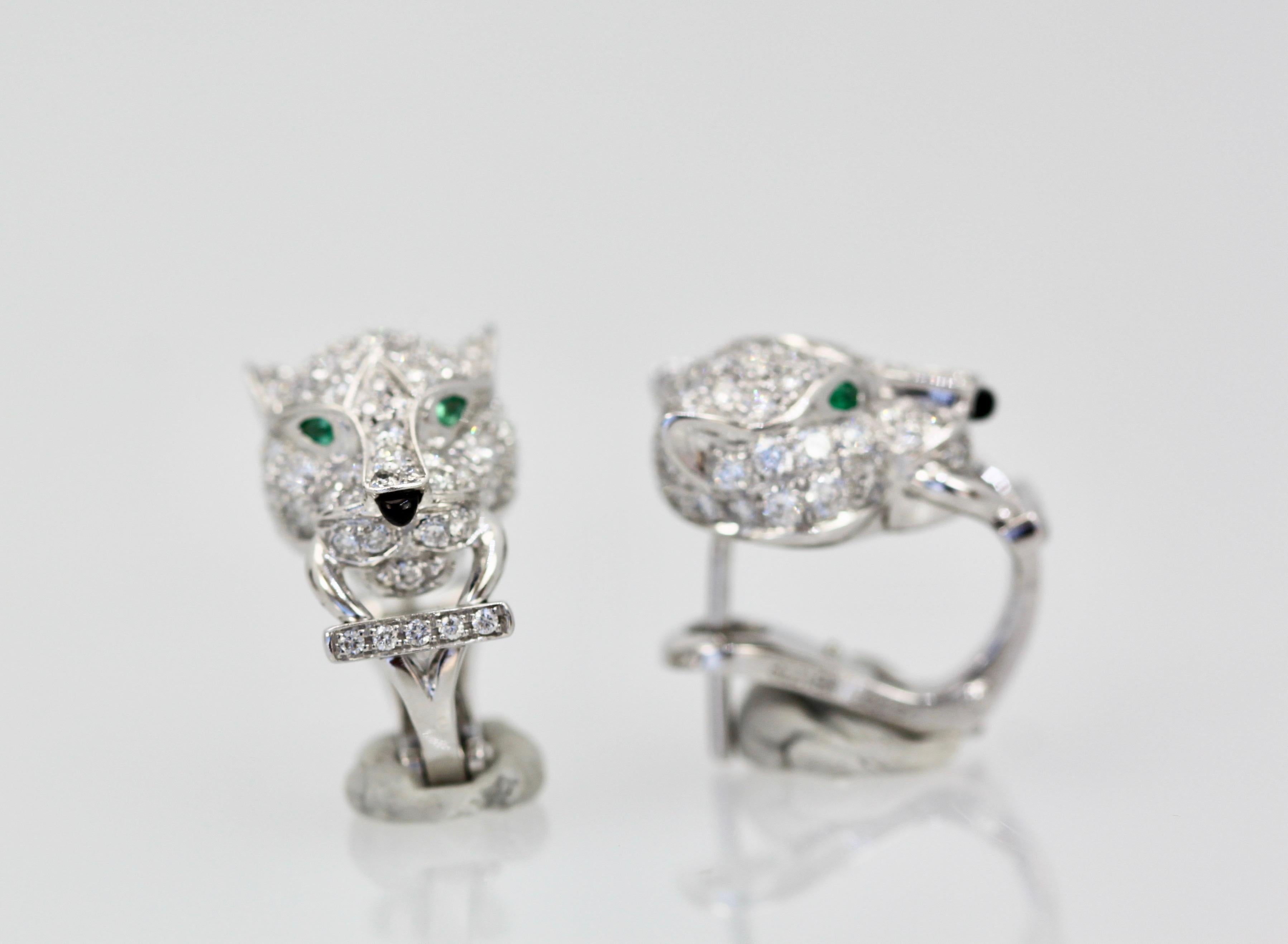 These Cartier Diamond Panthere Earrings are just gorgeous.  They are made in 18K White Gold and each earring is set with 76 brilliant cut Diamonds totaling 0.72 Carats.  The Eyes are Emeralds (4) and the nose is Onyx (2).  This is from the current
