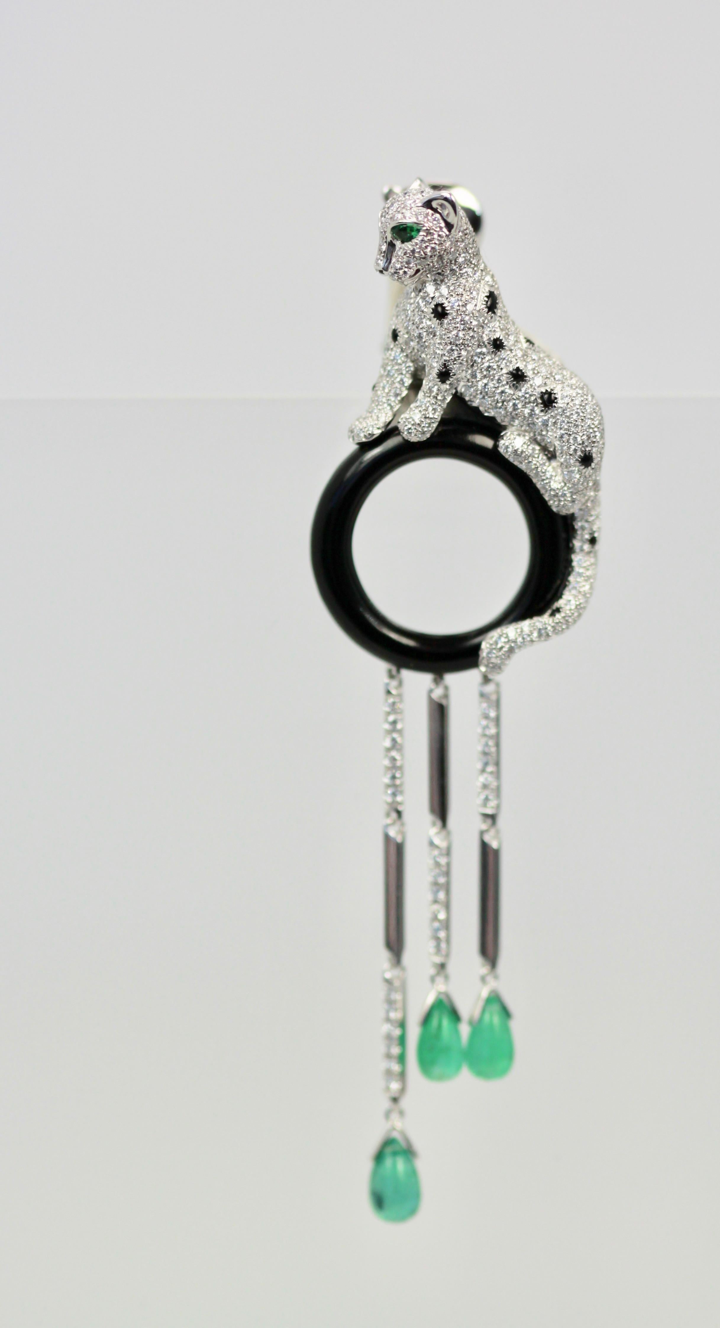These Cartier Diamond Panthere earrings with Onyx and Emeralds are 