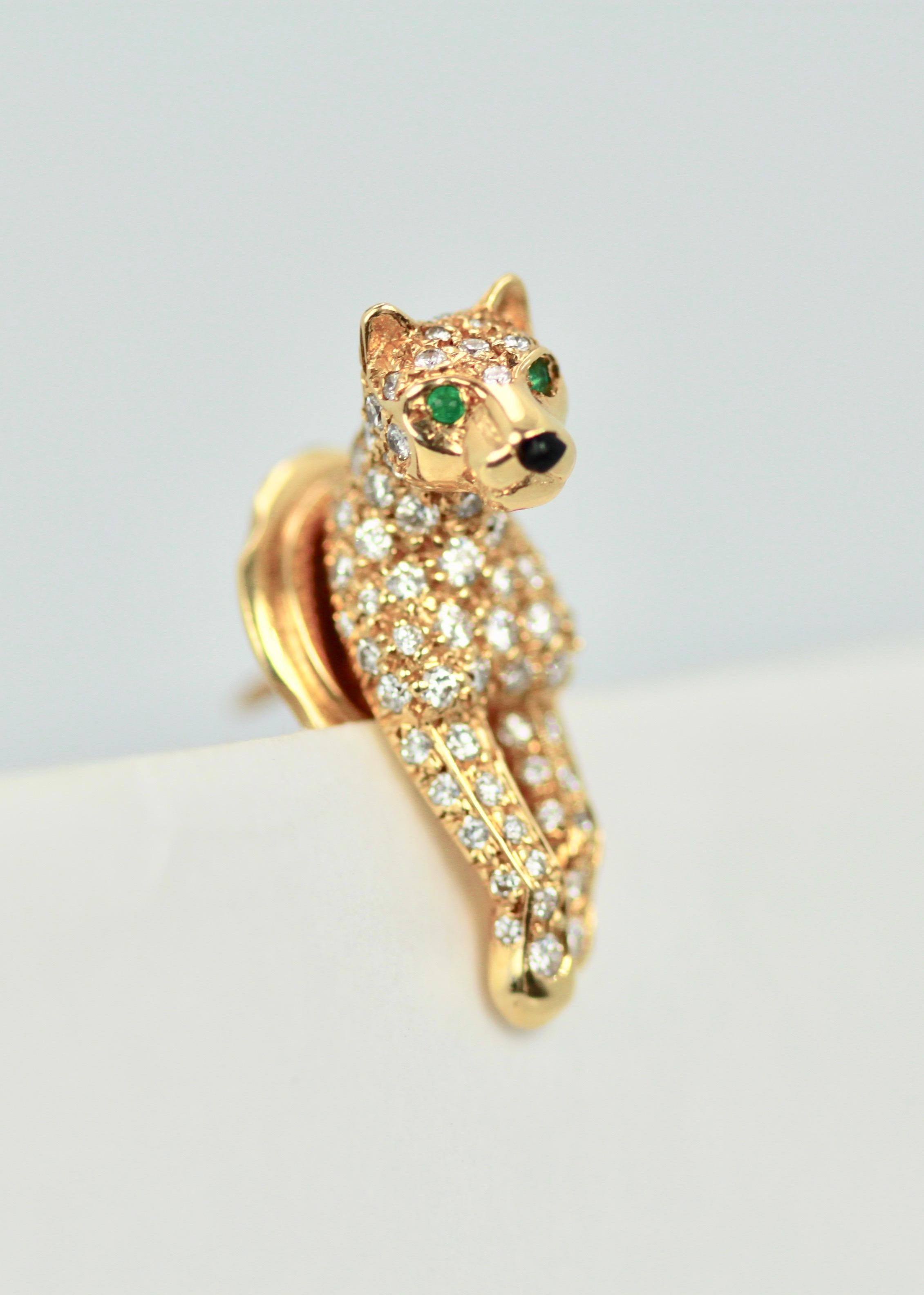 This Cartier Diamond Panthere Lapel Pin has been discontinued.  This iconic Panthere was made in 1992 with 0.9 carats of Brilliant cut Diamonds, Onyx nose, 2 Faceted Emerald Eyes (light Emerald) looks like Peridot but it is not they are Emeralds and