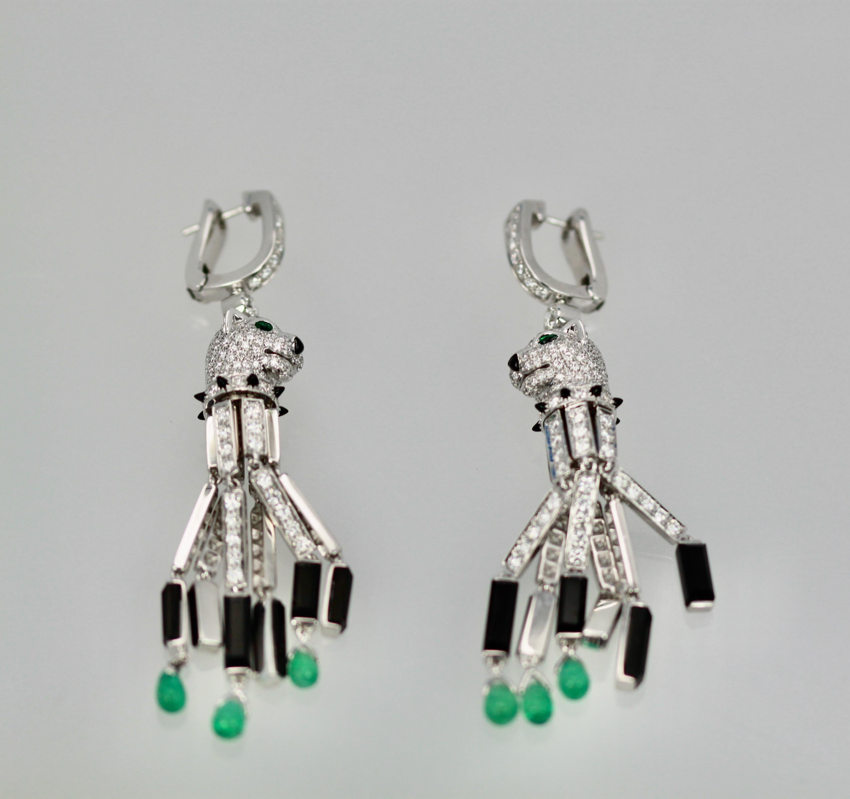 These Cartier Diamond Panthere Tassel Earrings are splendid and unusual as they sell for $153,000.  They consist of 10 Emeralds, 444 Diamonds E-F, VS Onyx plaques and Onyx studded collar.  There are 5.95 Carats of Diamonds.  You will not see these