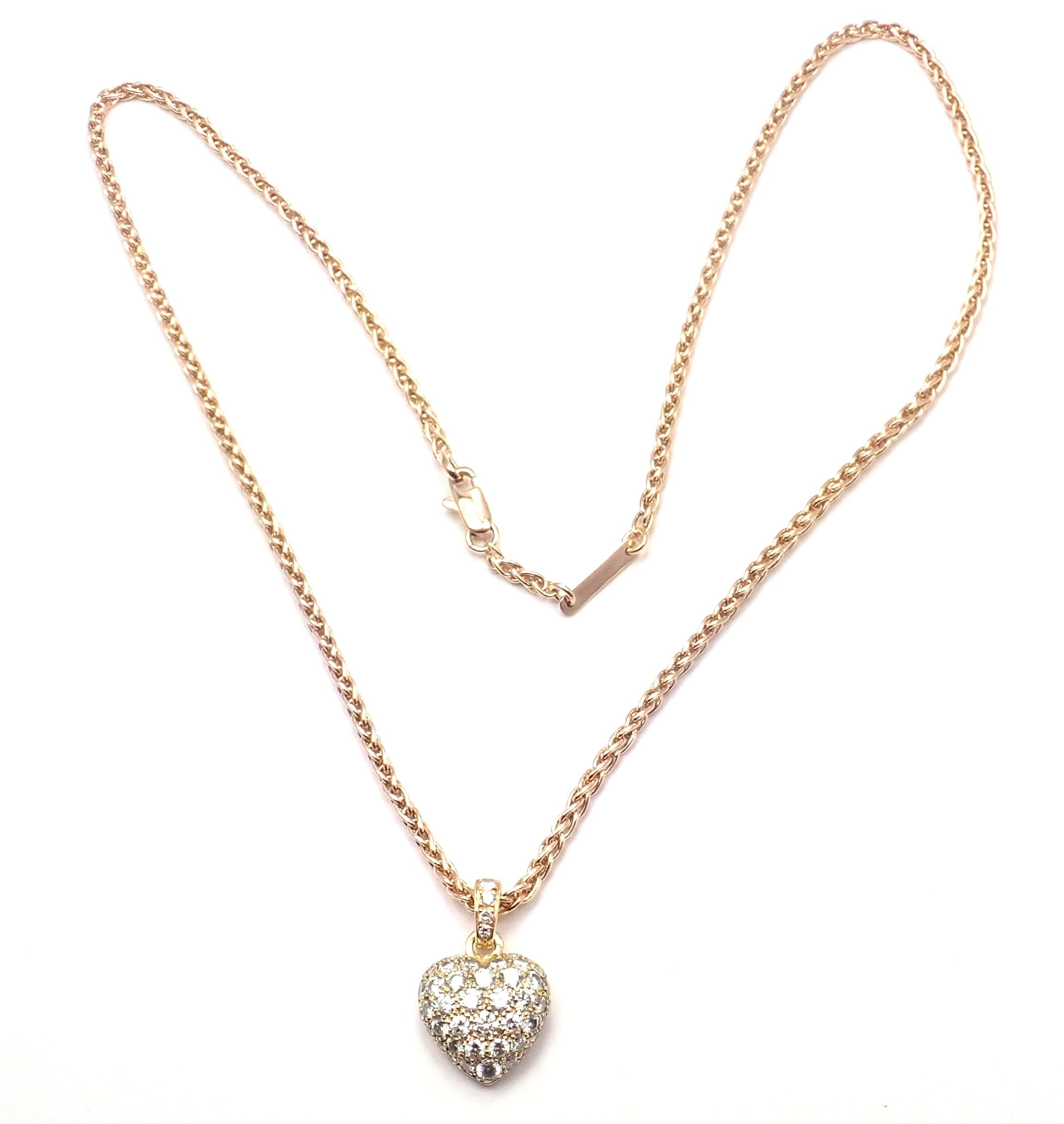 18k Yellow Gold Diamond Pave Heart Pendant Necklace by Cartier.
With Round brilliant cut diamonds VS1 clarity E color total weight approx. 2ct
Details:
Weight: 14.7 grams
Pendant Size: 22mm x 14mm
Width: 2mm
Length: 17.5