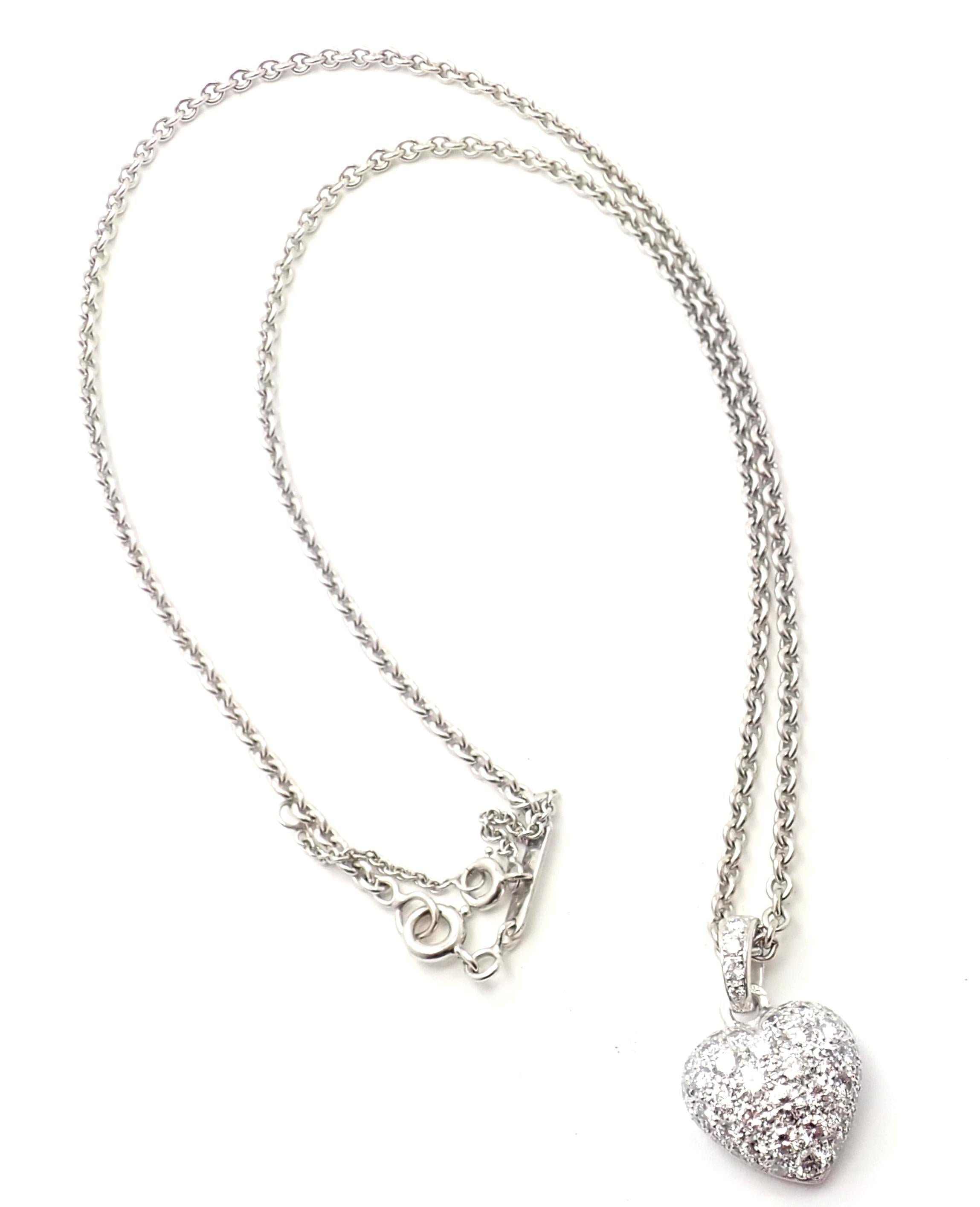 18k White Gold Diamond Pave Heart Pendant Necklace by Cartier.
With 54 Round brilliant cut diamonds
 VVS1 clarity, E color total weight approximately 2ct
Details:
Weight: 11.8 grams
Pendant Size: 22mm x 14mm
Width: 2mm
Length: 16