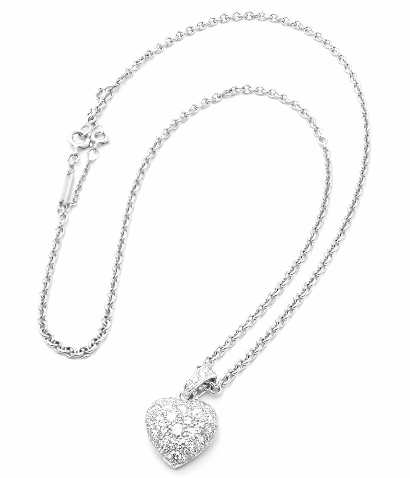 18k White Gold Diamond Pave Heart Pendant Necklace by Cartier.
With 54 Round brilliant cut diamonds
 VVS1 clarity, E color total weight approximately 2ct
Details:
Weight: 11.7 grams
Pendant Size: 22mm x 14mm
Width: 2mm
Length: 16