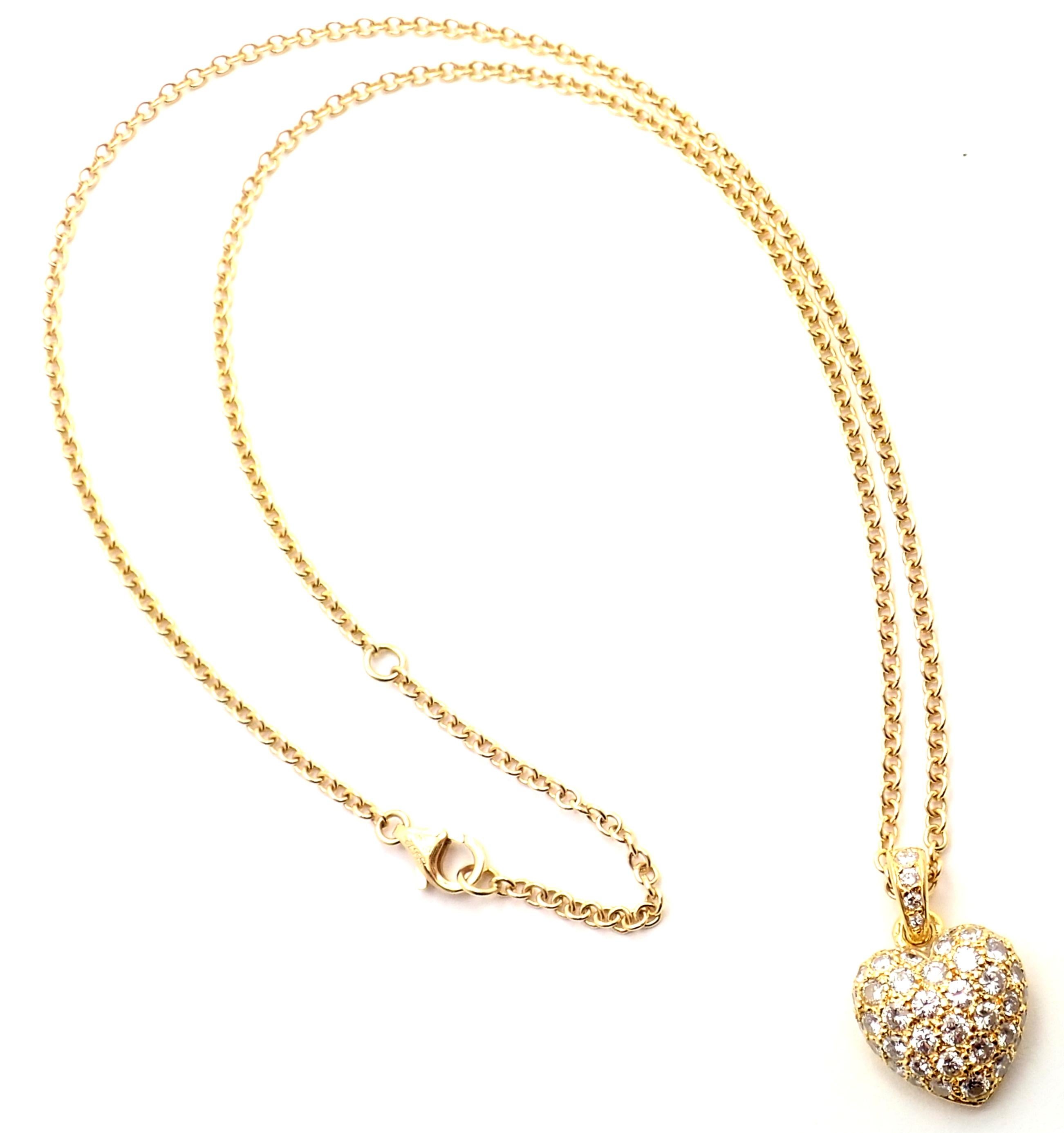 18k Yellow Gold Diamond Pave Heart Pendant Necklace by Cartier.
With Round brilliant cut diamonds VS1 clarity E color total weight approx. 2ct
Details:
Weight: 8.3 grams
Pendant Size: 21mm x 14mm
Width: 2mm
Length: 18