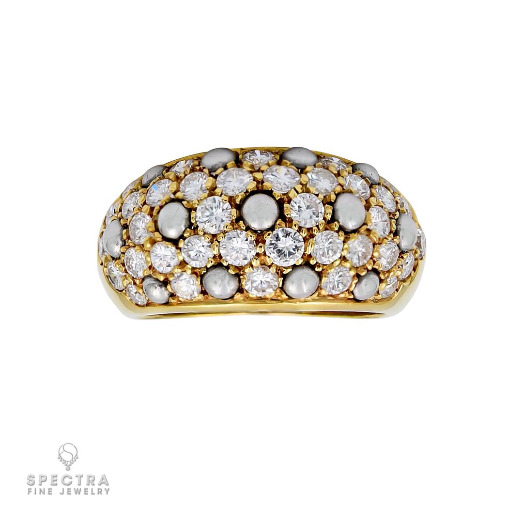 This stunning ring is an actual work of art, featuring 36 dazzling round brilliant-cut diamonds weighing approximately 2.16 carats. Each diamond averages 0.06 carats, with a color grading of D-E-F and a VS clarity rating, ensuring that each diamond