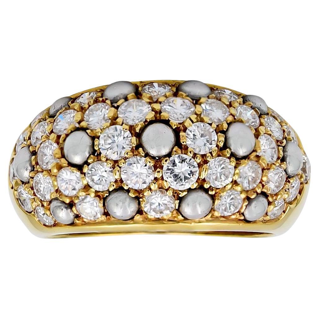 Anillo Cartier de diamantes y perlas en oro amarillo de 18 quilates