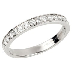 Anello a mezza eternità con diamante di Cartier in platino 1895