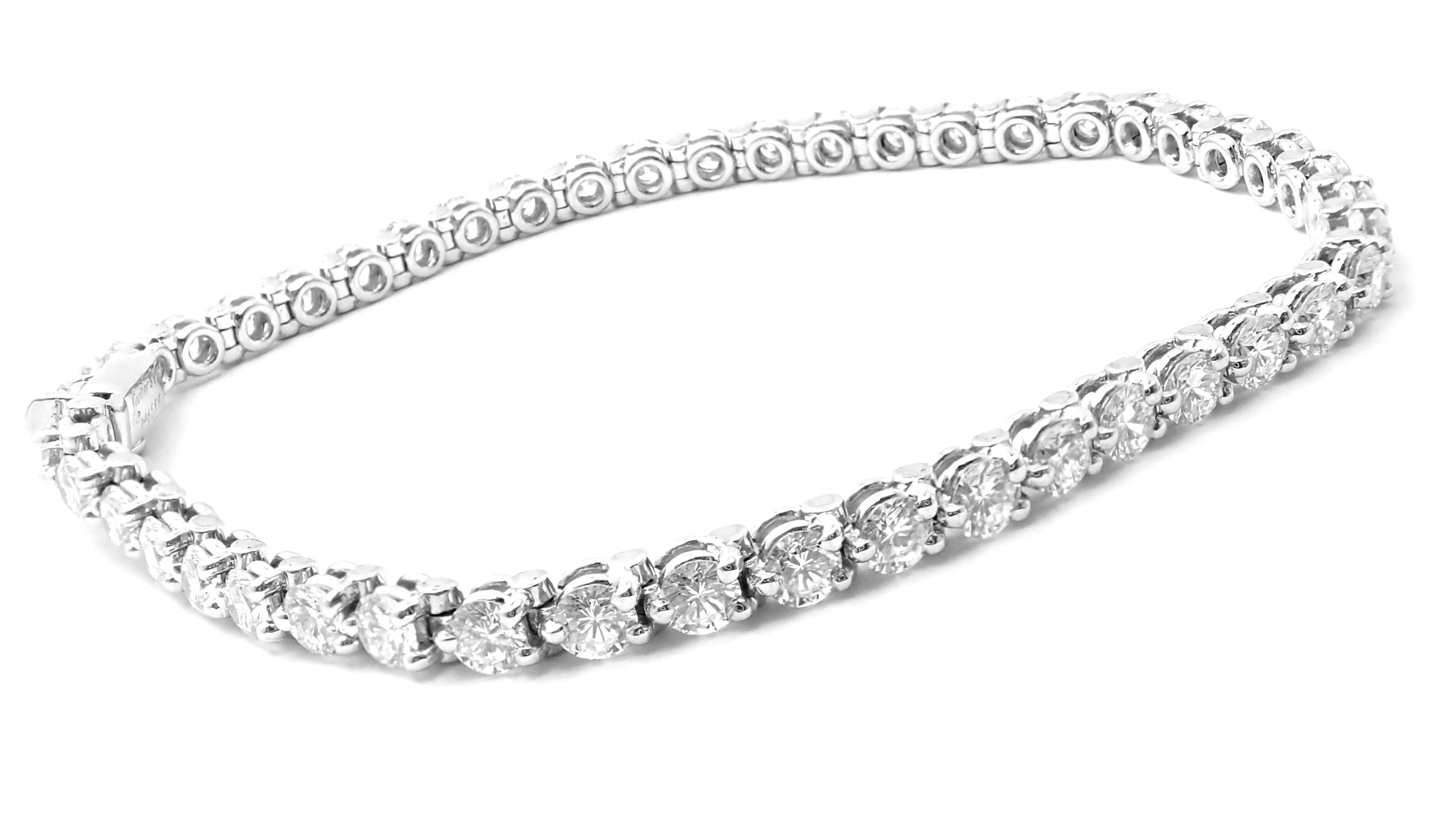 Platinum Diamond Line Tennis Bracelet by Cartier. 
This bracelet comes with Cartier box.
With 46 Round brilliant cut diamonds
 VVS1 clarity, E color total weight approx. 4.14ct
Details: 
Length: 6.5