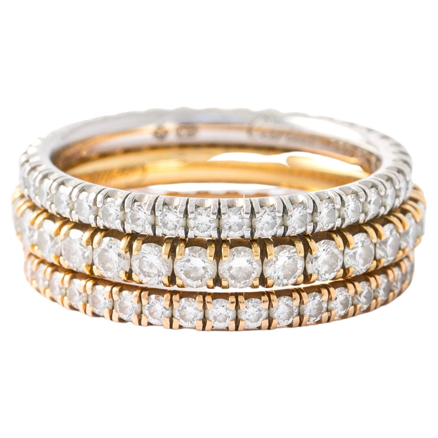 Pink gold wedding ring round diamond 0.50 carat. 
White gold wedding ring brillants. Ref. B4077952.
Yellow gold wedding ring round diamond 1.00 carat. 

Ring size: 52 / 6 US.

Total retail price: about Usd11,800.- purchased at Cartier boutique in
