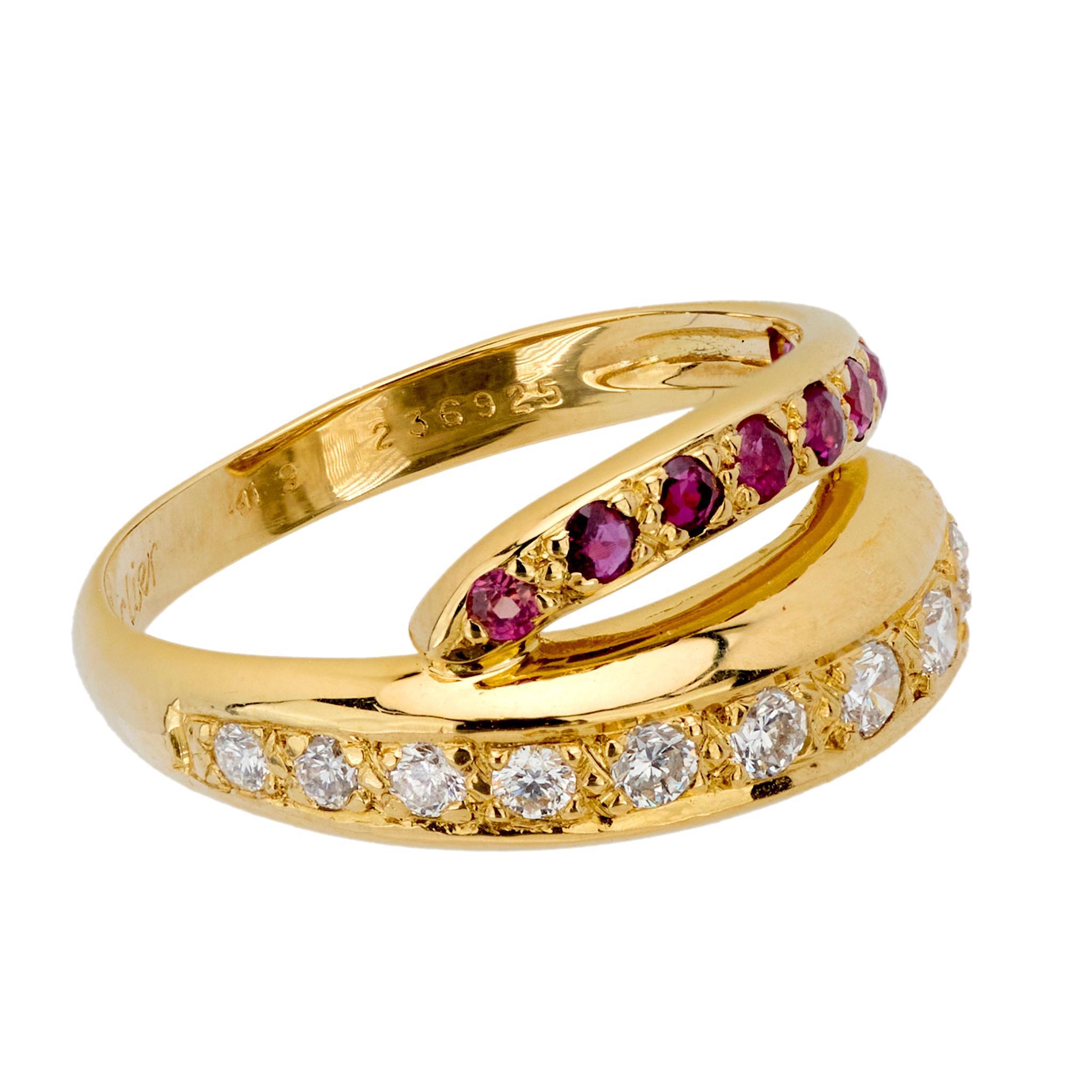 Modern Cartier diamond ruby 18k yellow gold bypass band For Sale