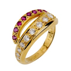 Cartier diamond ruby 18k yellow gold bypass band