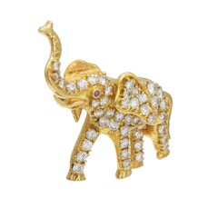 Cartier Diamond, Ruby, and Yellow Gold Elephant Brooch