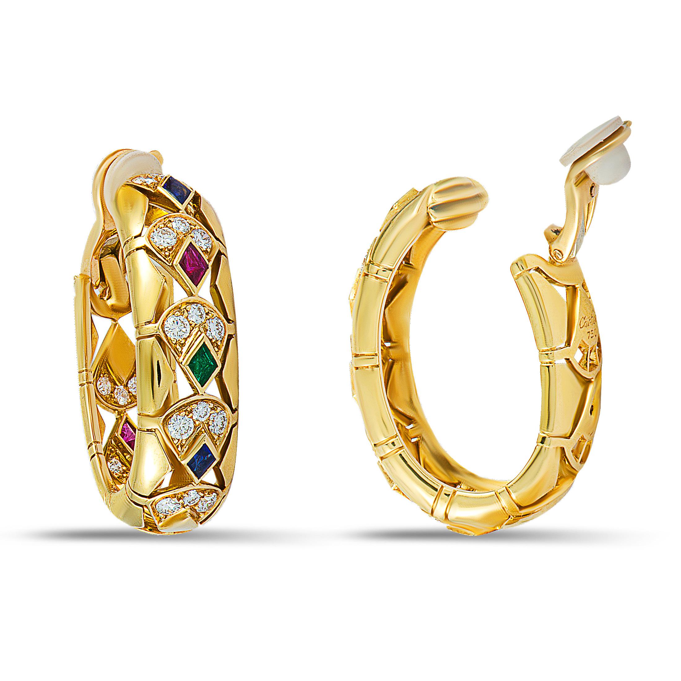 Beautifully designed in a stunningly intricate fashion and wonderfully embellished with a plethora of expertly cut, eye-catching gems, these extraordinary Cartier earrings will accentuate your ensembles in an incredibly attractive manner. The pair