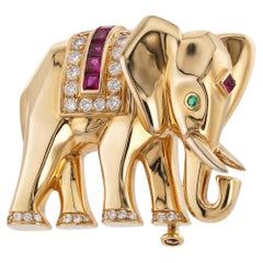 CARTIER Diamant Rubin Smaragd Gelbgold Elefanten Brosche