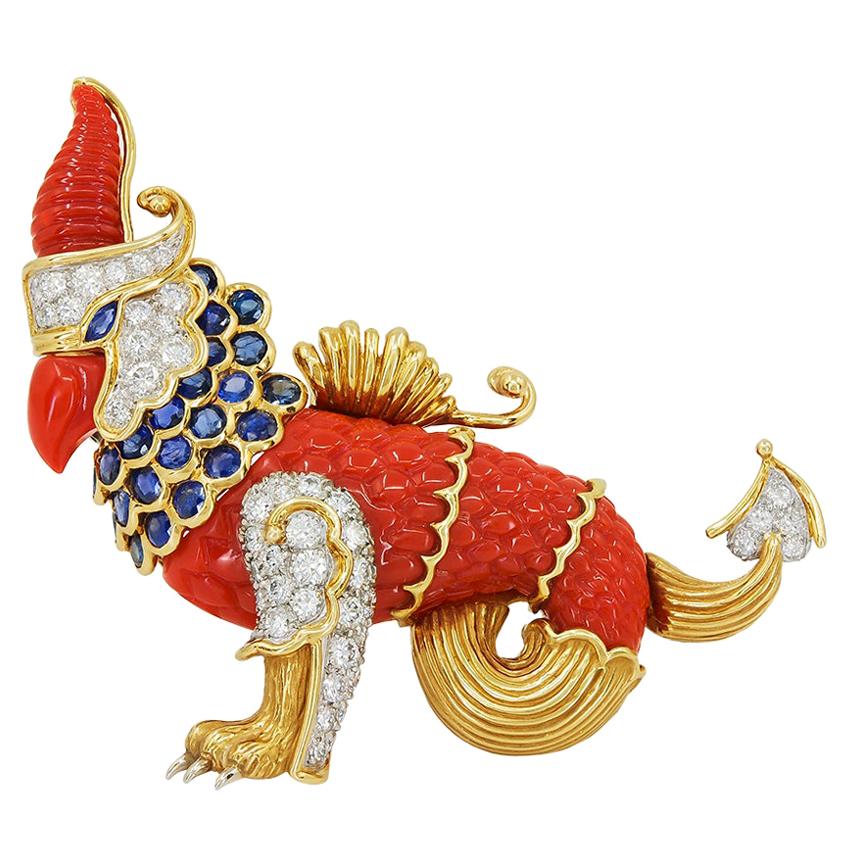 Cartier Diamond Sapphire Carved Coral Gold Griffin Brooch For Sale