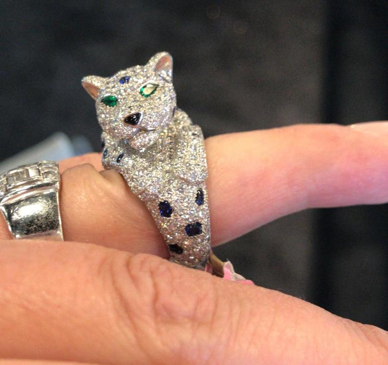 Cartier Diamond Sapphire Spots Onyx and Emerald Eyed Panther Ring In Excellent Condition For Sale In New York, NY