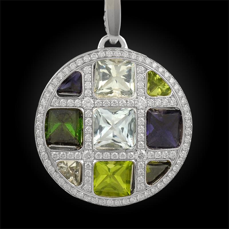 An exceptional vintage pasha necklace by Cartier, centering one large grid pendant embellished with brilliant diamonds and semi precious stones mounted in 18k white gold.

Signed Cartier.
